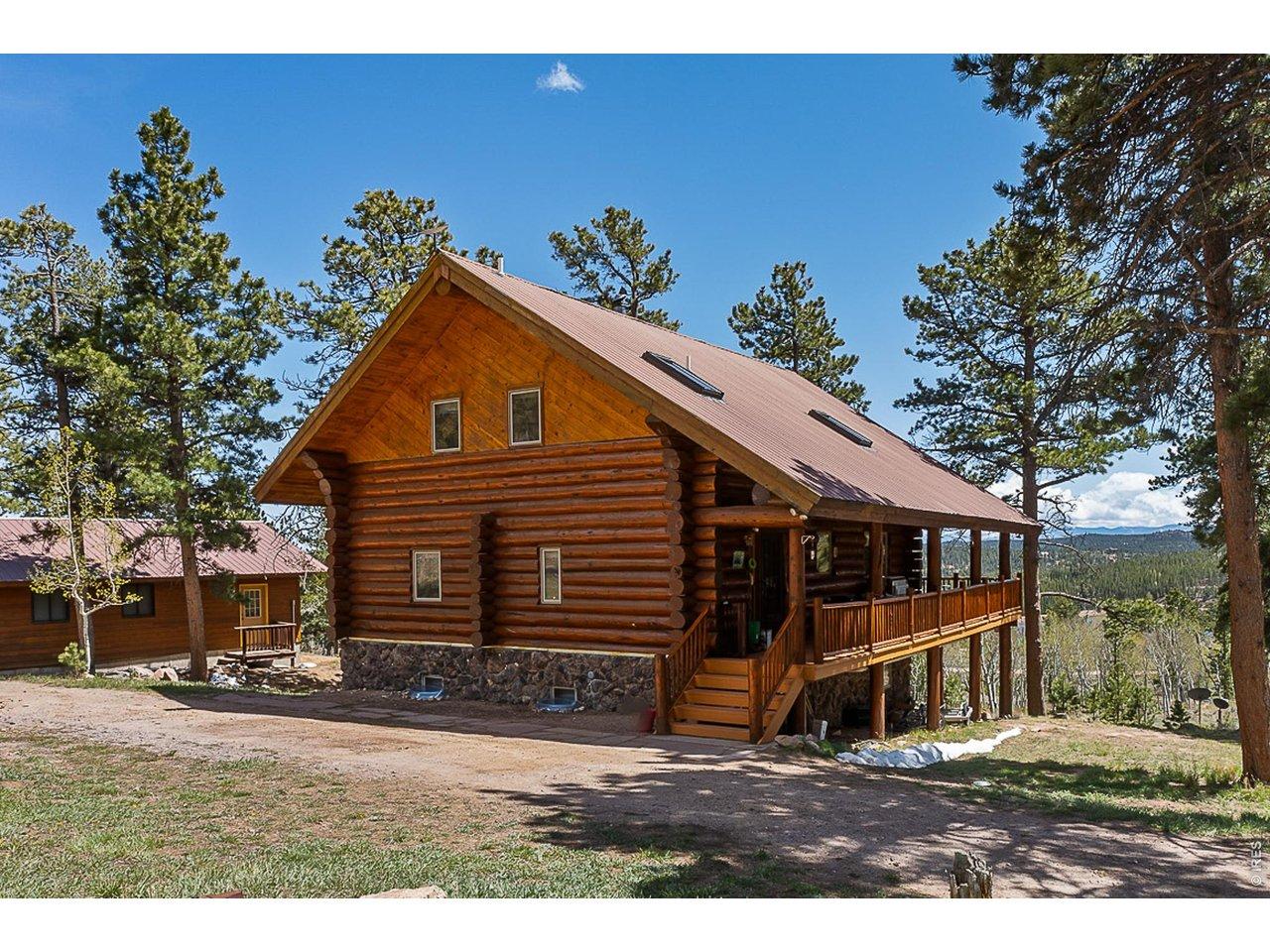 Image 1: Welcome to 24 Sarsi Ct. beautiful full log home with lake and snowcapped mountain views Image 1: Welcome to 24 Sarsi Ct. beautiful full log home with lake and snowcapped mountain views