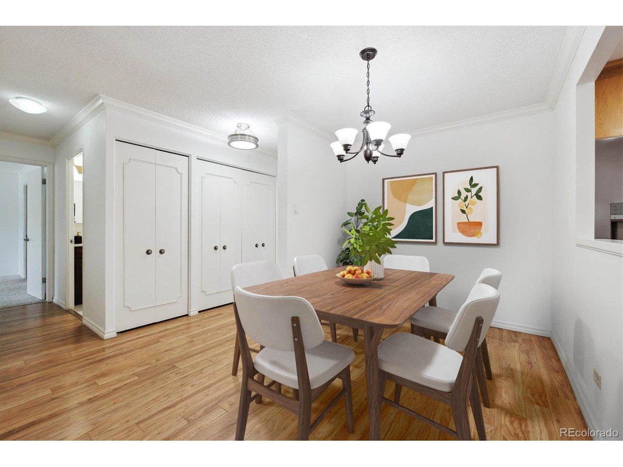 Image 3: Front Entry and Dining Room Space- Front Closet and Pantry Closet