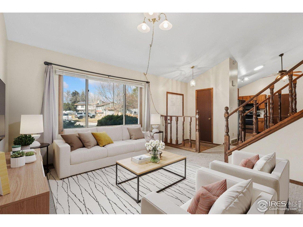 Image 2: Main Level Welcomes you with a Tile Entry (Virtually Staged)