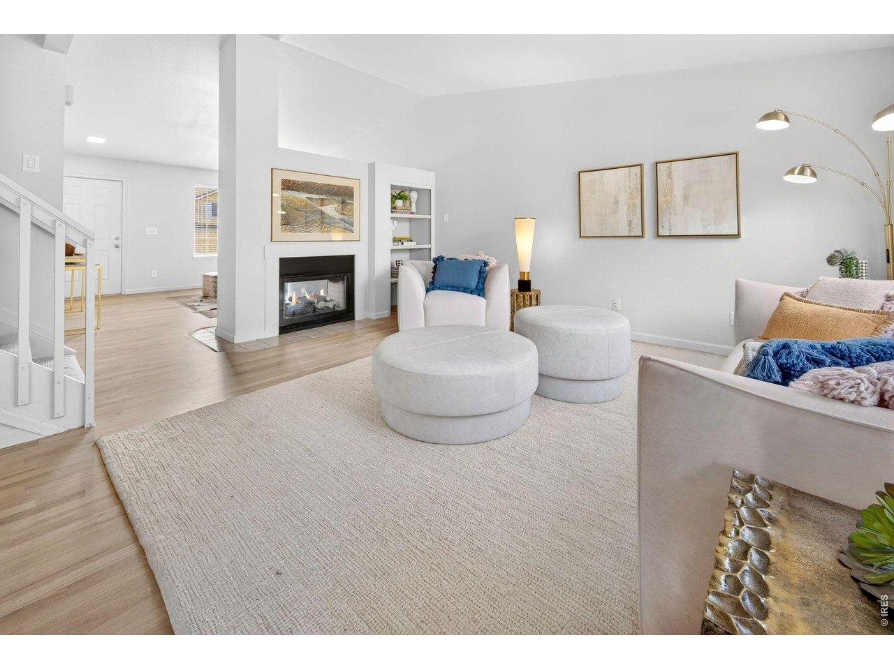 Image 4: Light-filled Living Room with Gas Fireplace