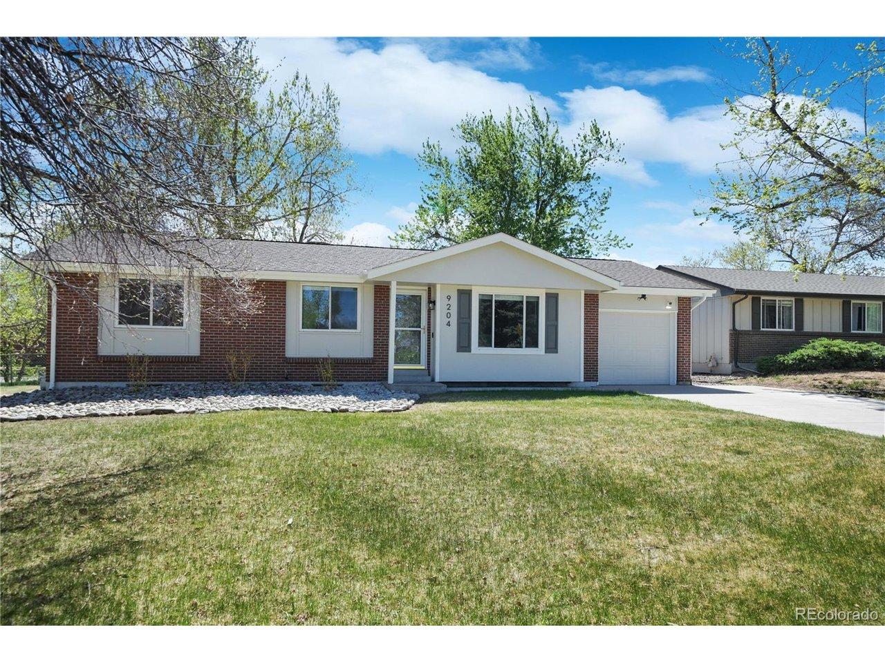 Image 3: Freshly updated landscaping and exterior paint on the mid-century brick ranch! Image 3: Freshly updated landscaping and exterior paint on the mid-century brick ranch!