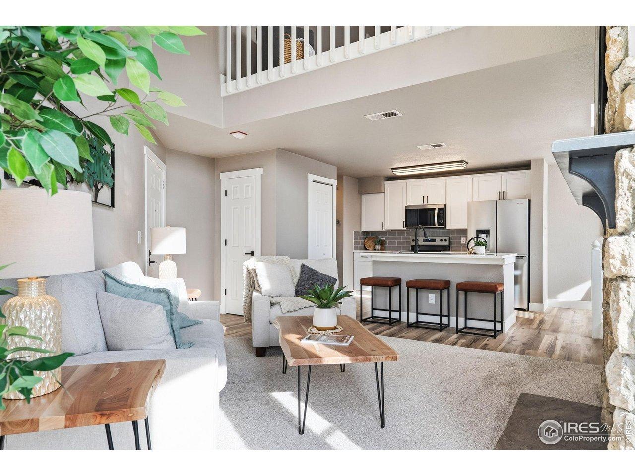 Image 3: Stylishly updated with all-new LVP, carpet, paint & trim. Image 3: Stylishly updated with all-new LVP, carpet, paint & trim.