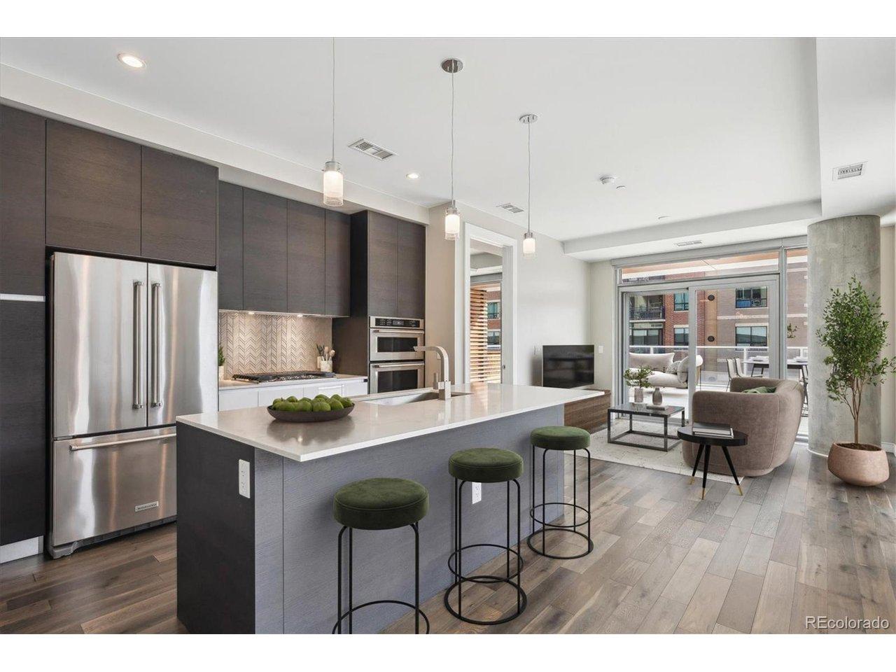 Image 2: The kitchen is as functional as it is stylish, featuring sleek Italkraft cabinetry, quartz countertops, and premium KitchenAid stainless steel appliances-perfectly suited for everything from casual meals to curated entertaining. Image 2: The kitchen is as functional as it is stylish, featuring sleek Italkraft cabinetry, quartz countertops, and premium KitchenAid stainless steel appliances-perfectly suited for everything from casual meals to curated entertaining.