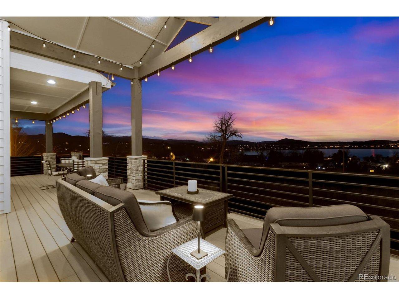 Image 4: Oversized Trex deck with gas plumbing, landscape lights and iron railing