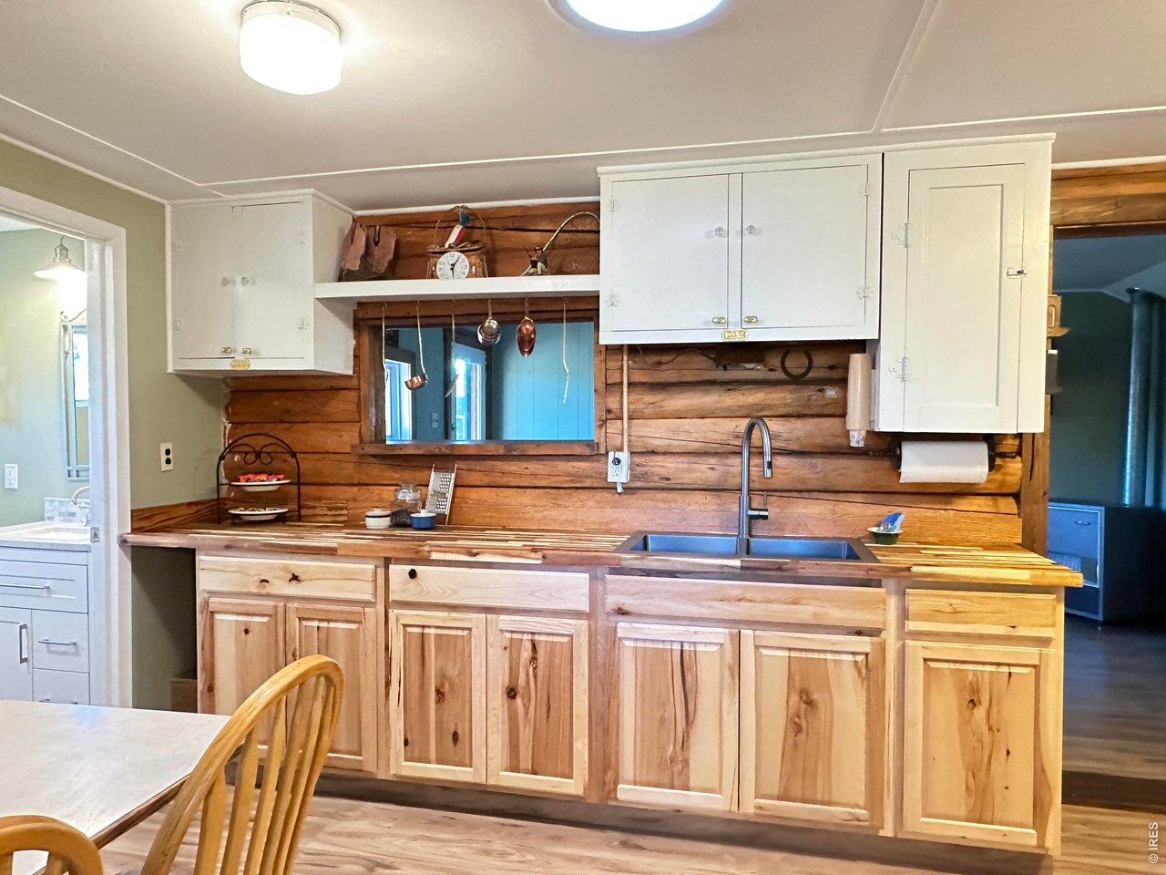 Image 3: New Hickory cabinets and Butcher block counter tops along with Black stainless steel sink finish out this new Kitchen Image 3: New Hickory cabinets and Butcher block counter tops along with Black stainless steel sink finish out this new Kitchen
