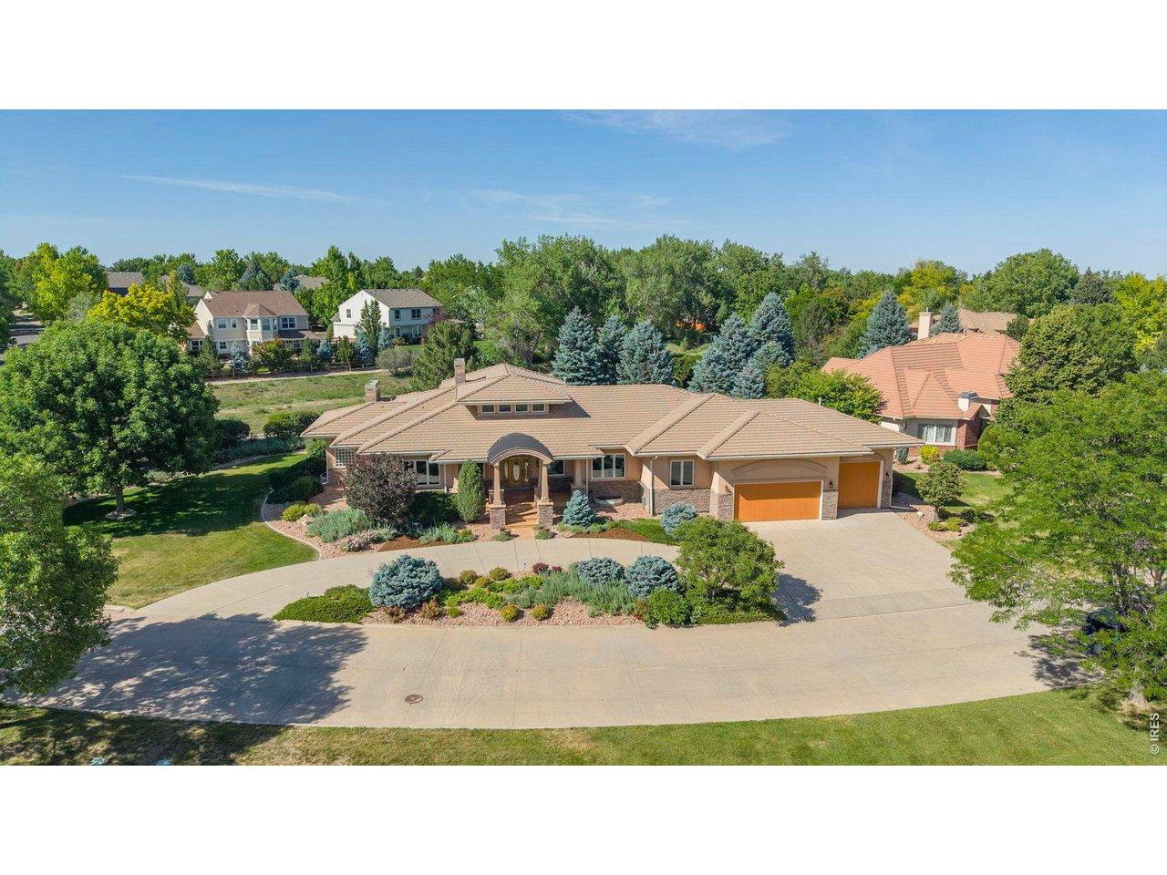 Image 3: An inviting circular driveway welcomes you