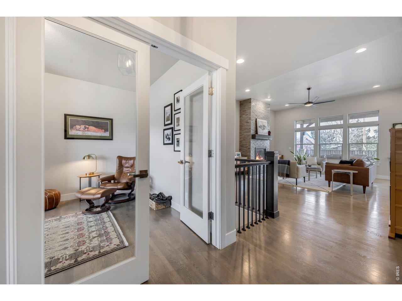 Image 4: Front Entrance: French doors leading to bedroom 3, abundant natural light