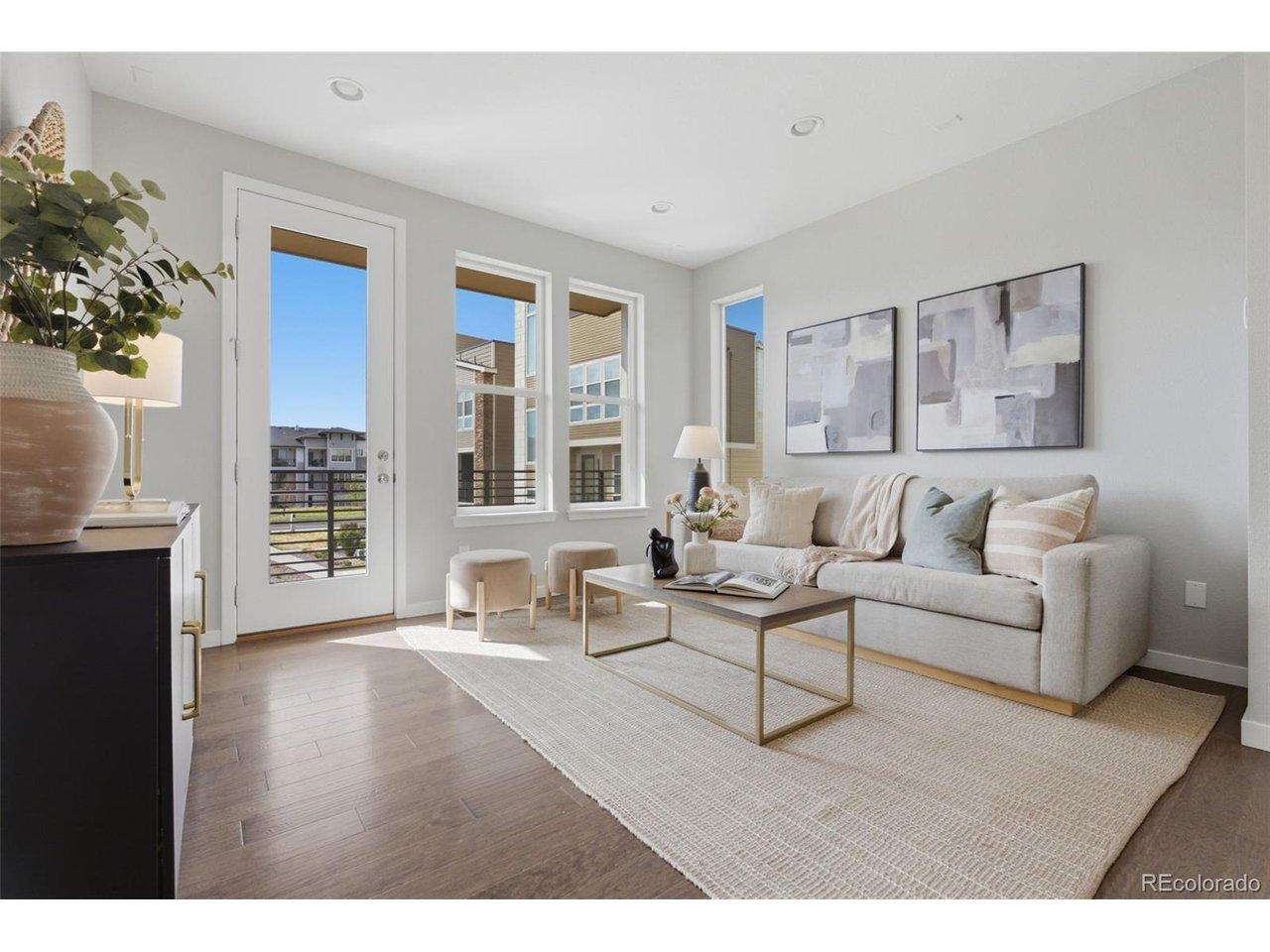Image 1: Open-concept living room filled with natural light Image 1: Open-concept living room filled with natural light