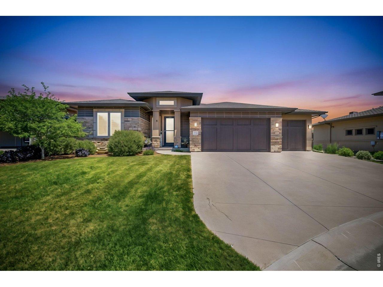 Image 1: The three car garage will provide extra room for your recreation toys and tools.