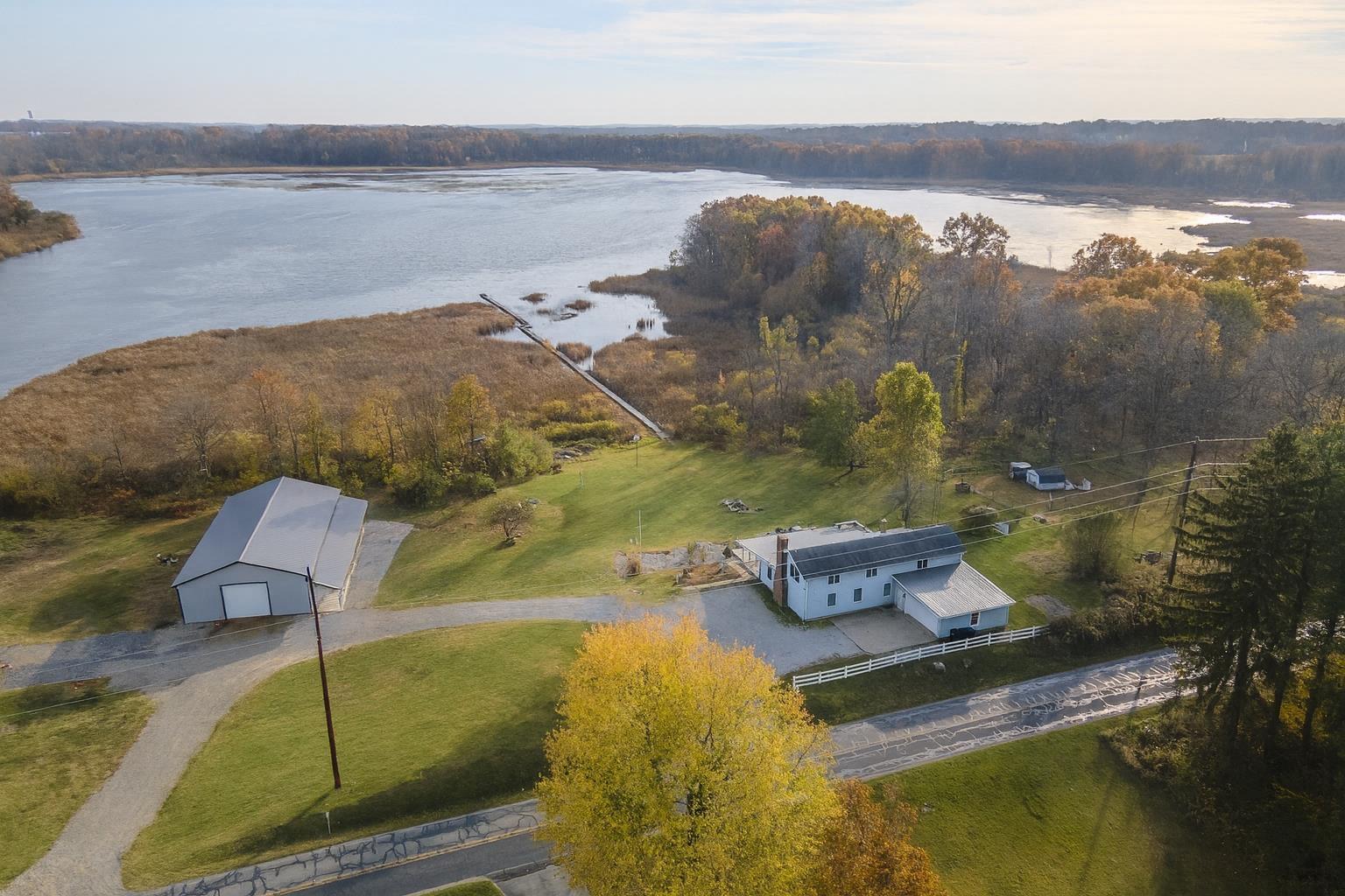 Image 0: Home & Pole Barn 4 Acres with lake frontage on non ski lake Image 0: Home & Pole Barn 4 Acres with lake frontage on non ski lake