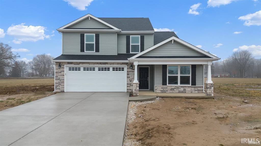 Image 0: Craftsman-style home featuring stone siding, a porch, an attached garage, driveway, and a shingled roof, Front Of Structure Image 0: Craftsman-style home featuring stone siding, a porch, an attached garage, driveway, and a shingled roof, Front Of Structure