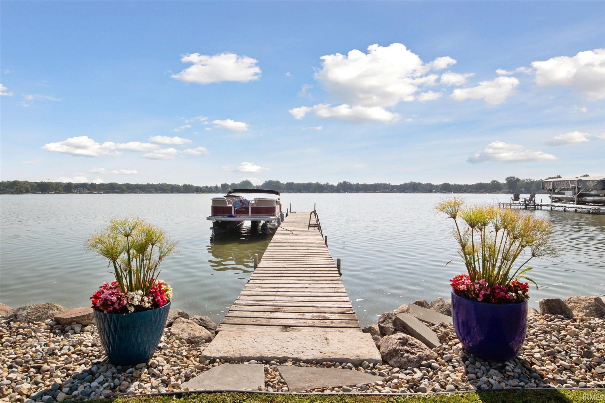 Image 2: Dock with boat lift and a water view, Dock