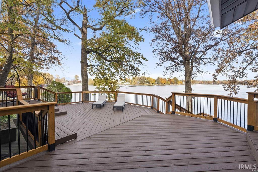 Image 3: Wooden terrace featuring a water view, Deck