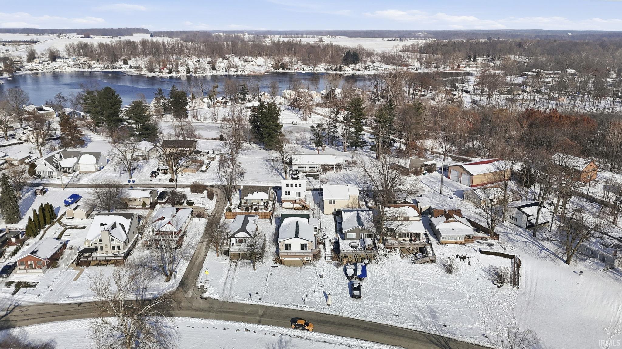 Image 0: Snowy aerial view featuring a residential view, Aerial View