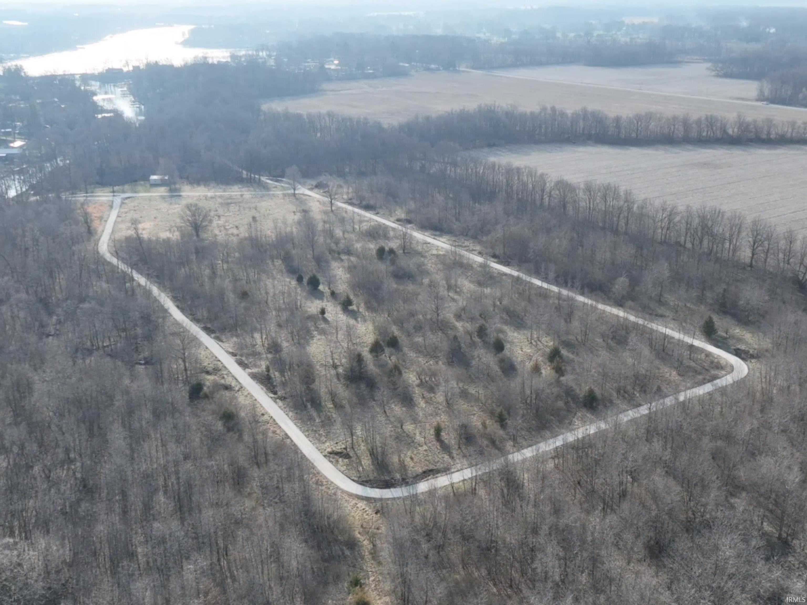 Image 1: Overview of rural landscape with property boundaries highlighted, Aerial View