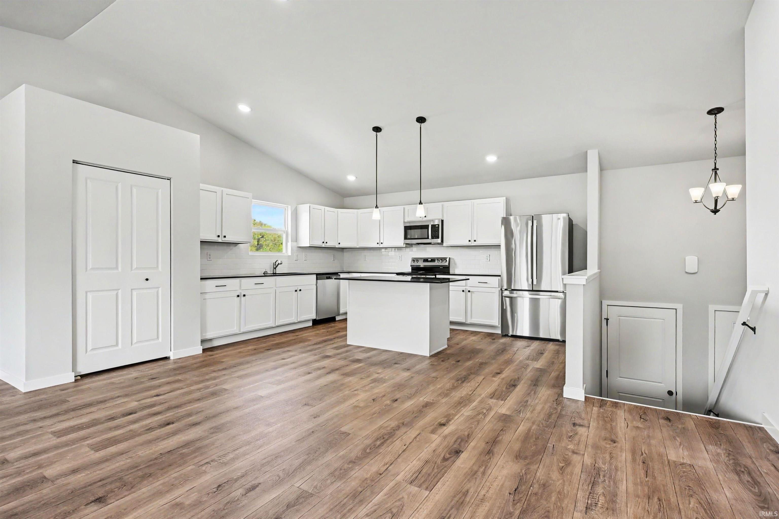 Image 1: The split level allows for 2 common gathering areas, plus 4 large bedrooms., Upper Level Image 1: The split level allows for 2 common gathering areas, plus 4 large bedrooms., Upper Level