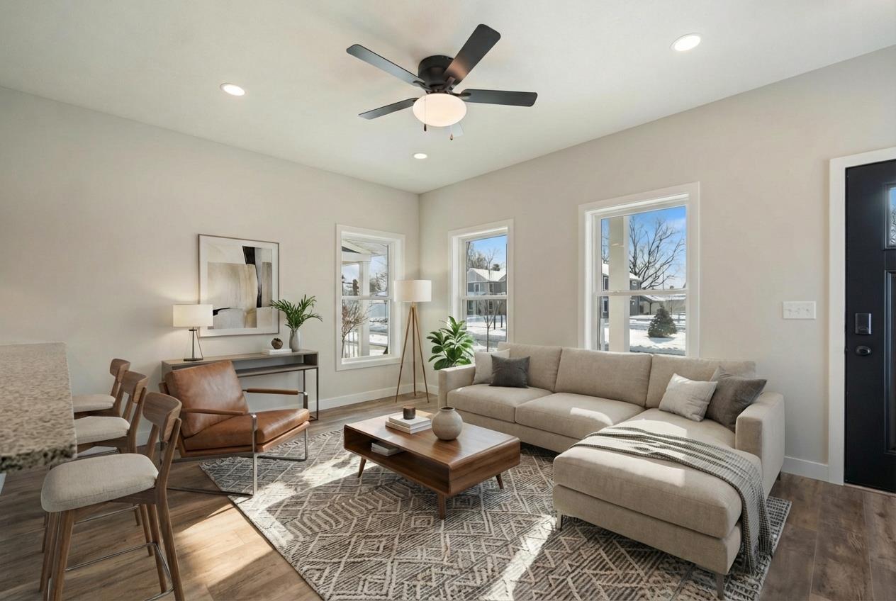 Image 2: Living area with recessed lighting, wood finished floors, healthy amount of natural light, and a ceiling fan, Living Room Image 2: Living area with recessed lighting, wood finished floors, healthy amount of natural light, and a ceiling fan, Living Room