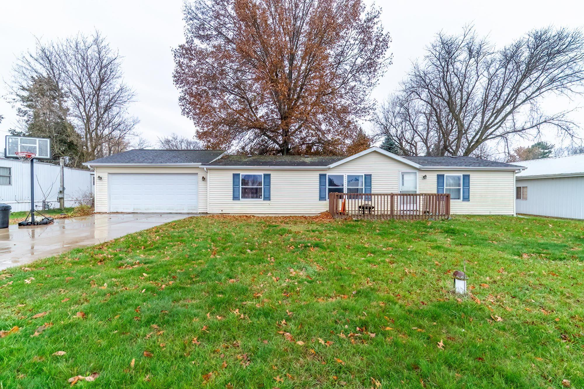 Image 1: Ranch-style home with a front yard, driveway, and a garage, Front Of Structure Image 1: Ranch-style home with a front yard, driveway, and a garage, Front Of Structure