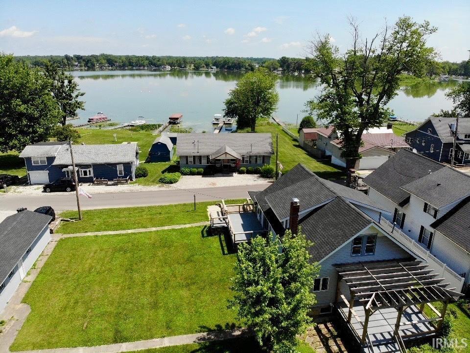 Image 2: Aerial view of residential area with a nearby body of water, Aerial View Image 2: Aerial view of residential area with a nearby body of water, Aerial View