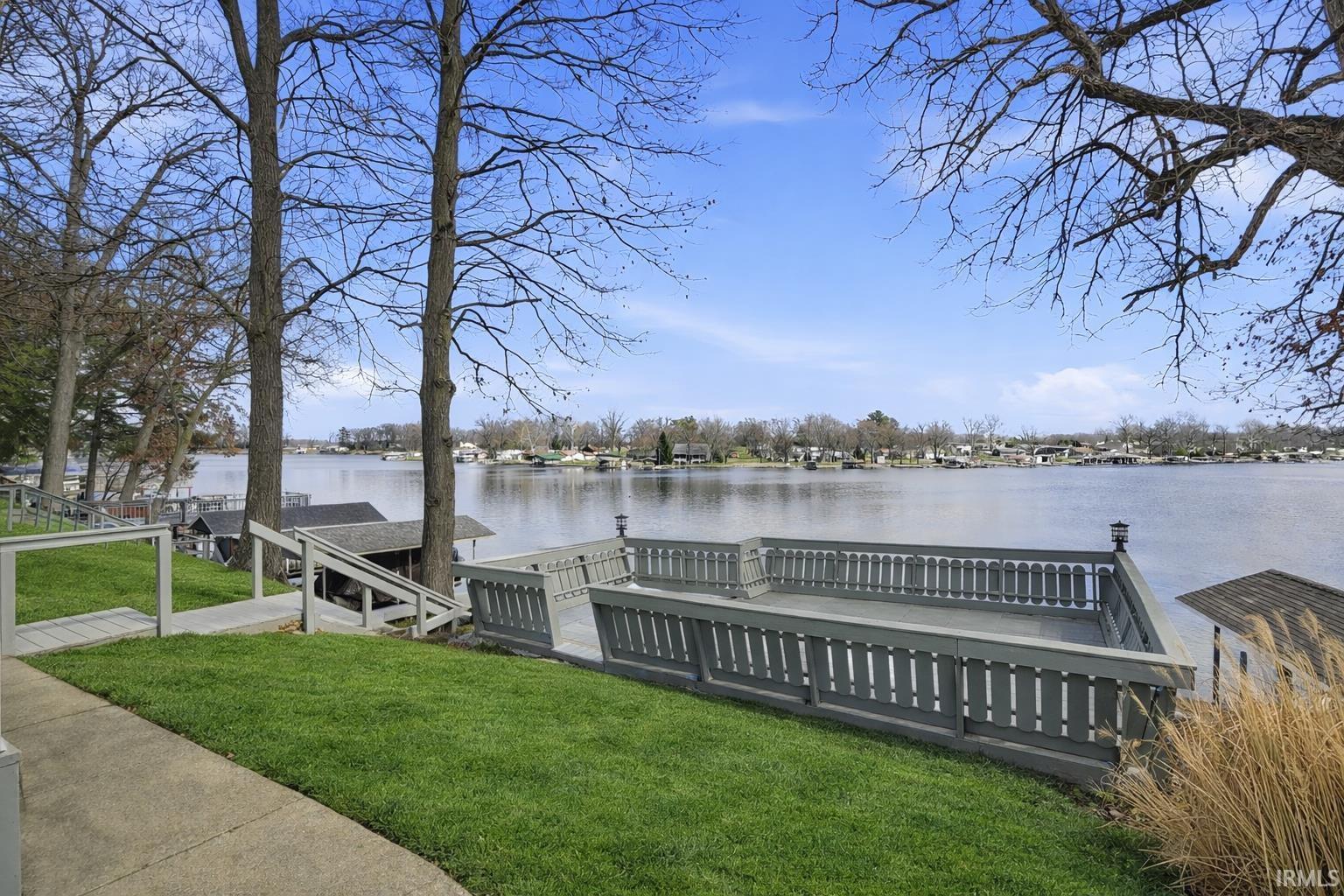 Image 2: Dock with a lawn and a water view, Dock