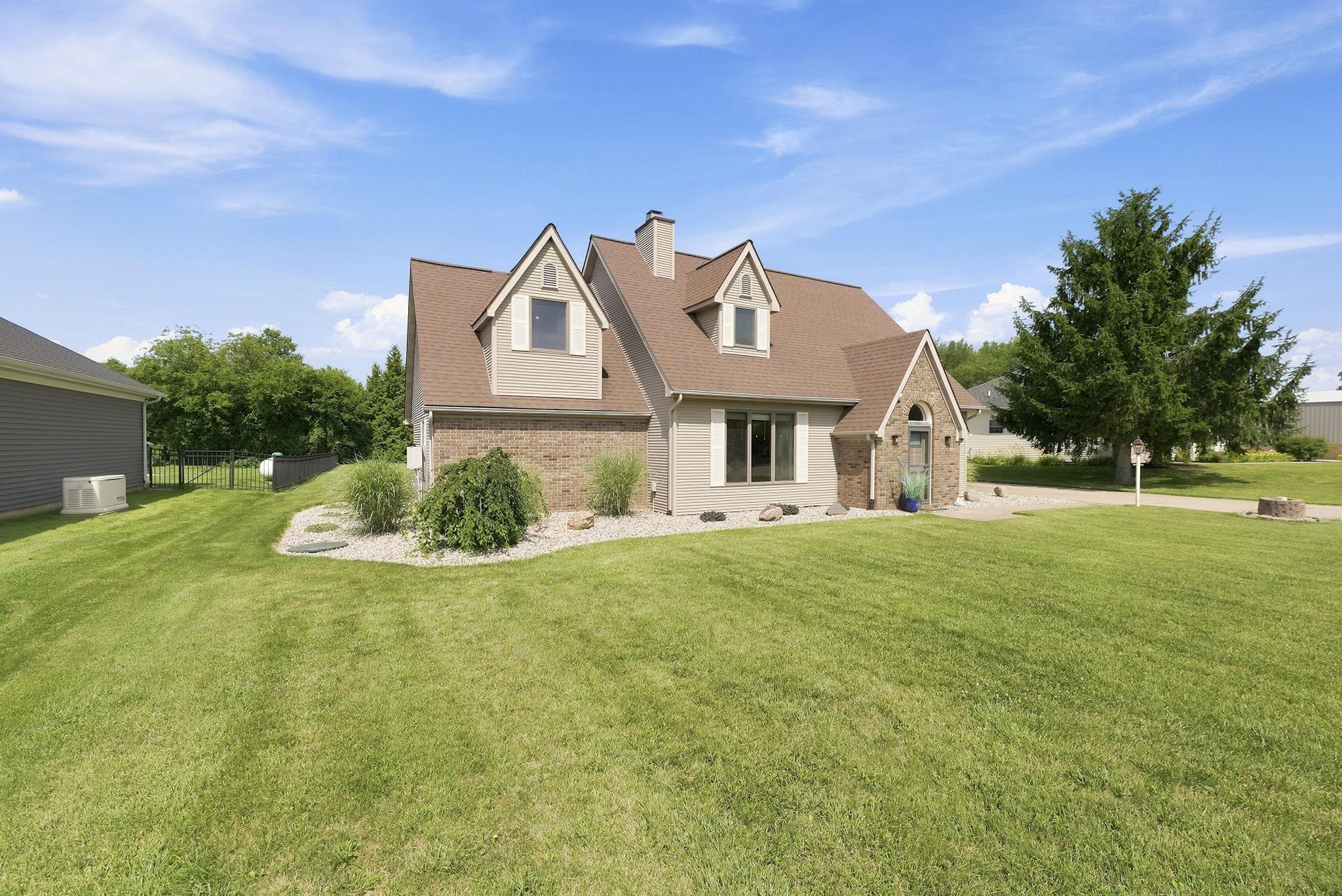 Image 1: Spacious front yard featuring a manicured lawn, Front Of Structure