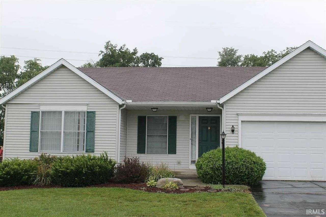 Image 0: Light-colored siding exterior with a dark shingle roof, Front Of Structure