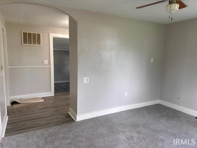 Image 3: Spacious interior featuring neutral paint, grey carpeting, and an arched doorway, Other Image 3: Spacious interior featuring neutral paint, grey carpeting, and an arched doorway, Other