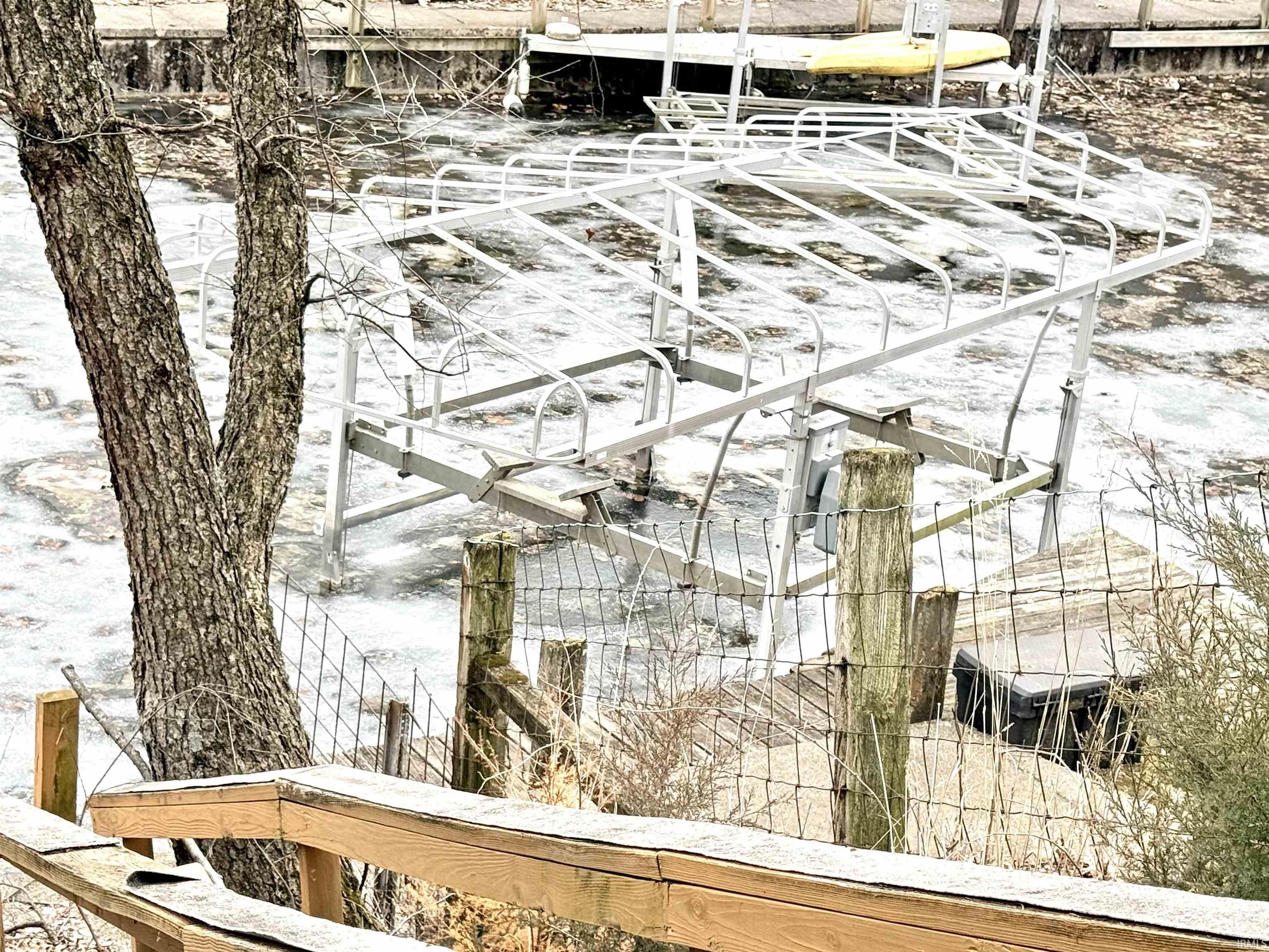 Image 3: View of side of property featuring a floating dock, Side Of Structure