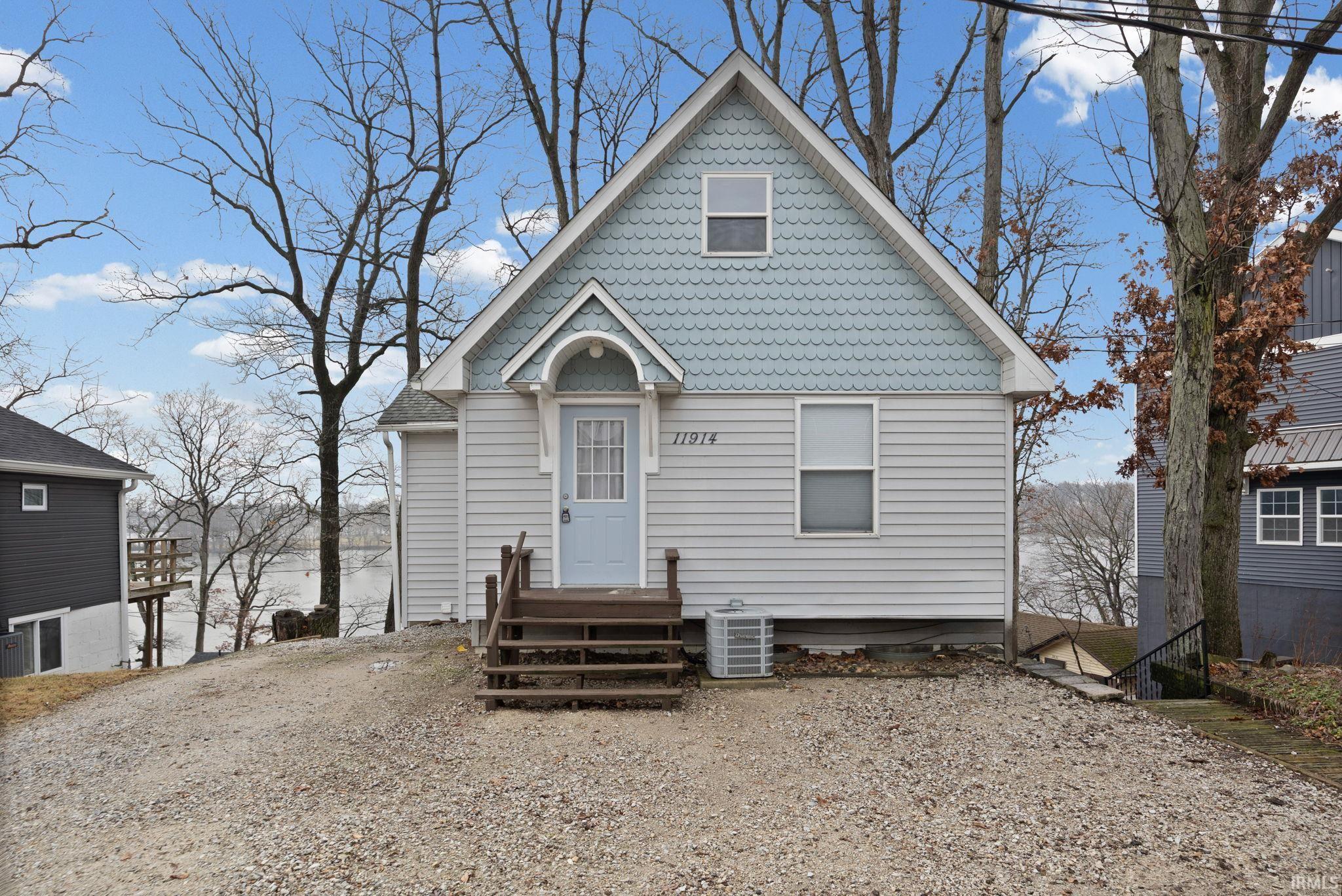 Image 0: View of front of property with entry steps, Front Of Structure