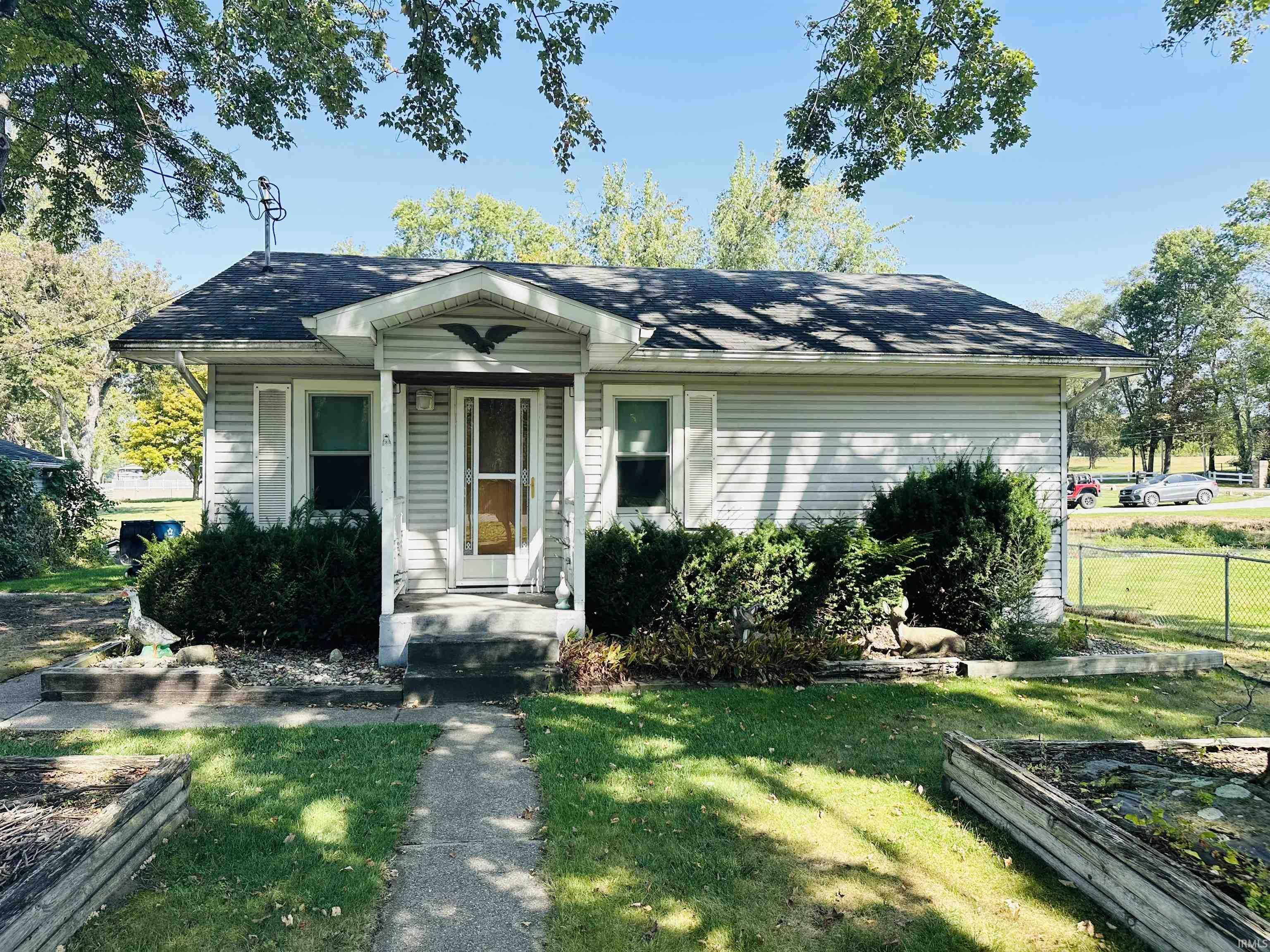 Image 0: View of front of property with roof with shingles, Front Of Structure