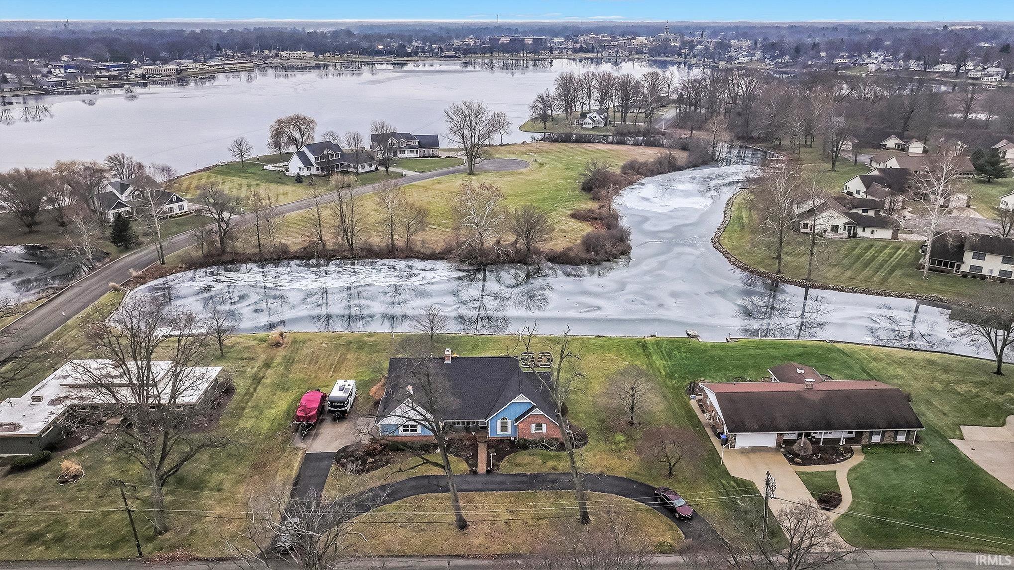 Image 1: Drone / aerial view of a nearby body of water and a notable bridge, Aerial View