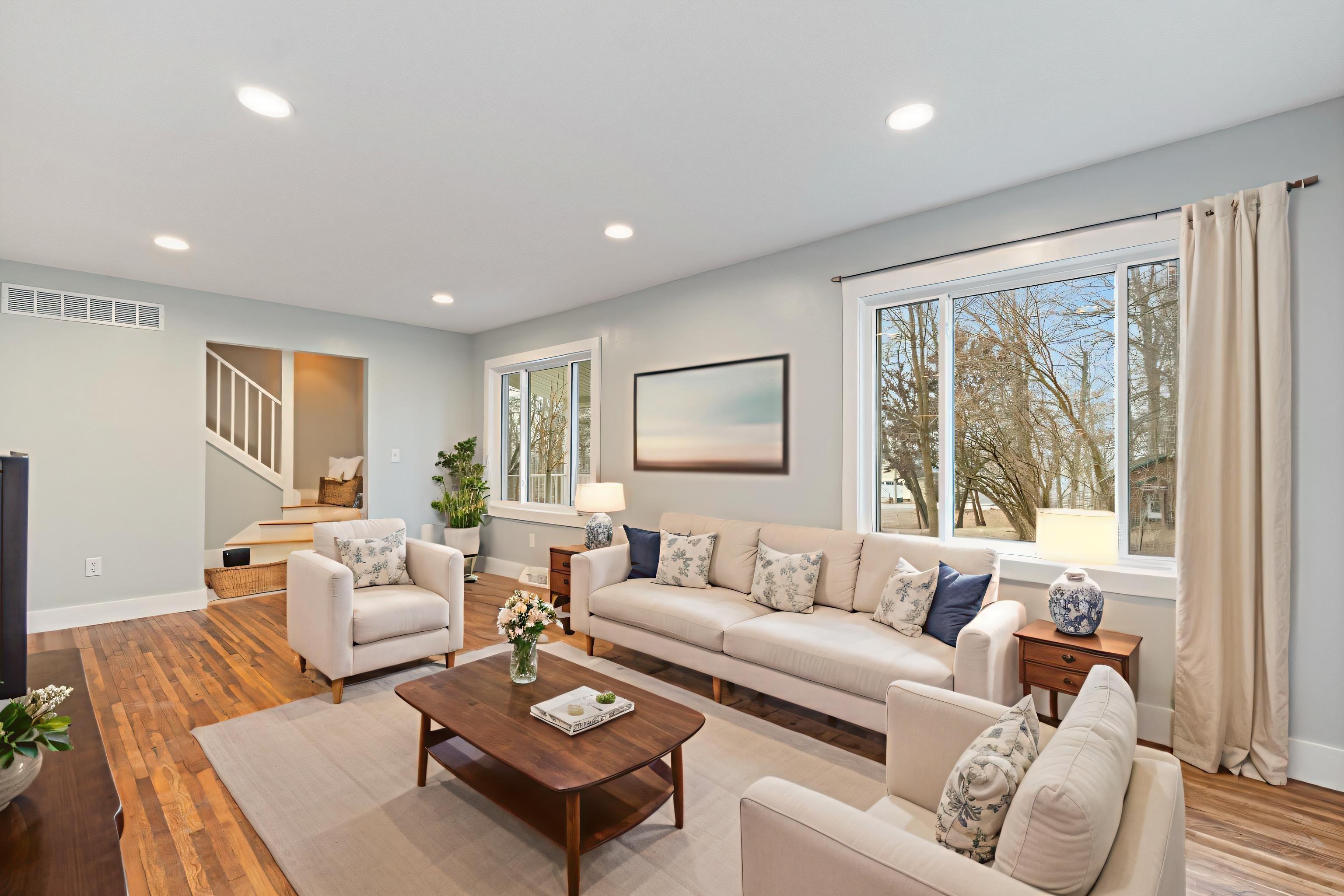 Image 3: Living room with recessed lighting, hardwood / wood-style floors, and stairs, Living Room Image 3: Living room with recessed lighting, hardwood / wood-style floors, and stairs, Living Room