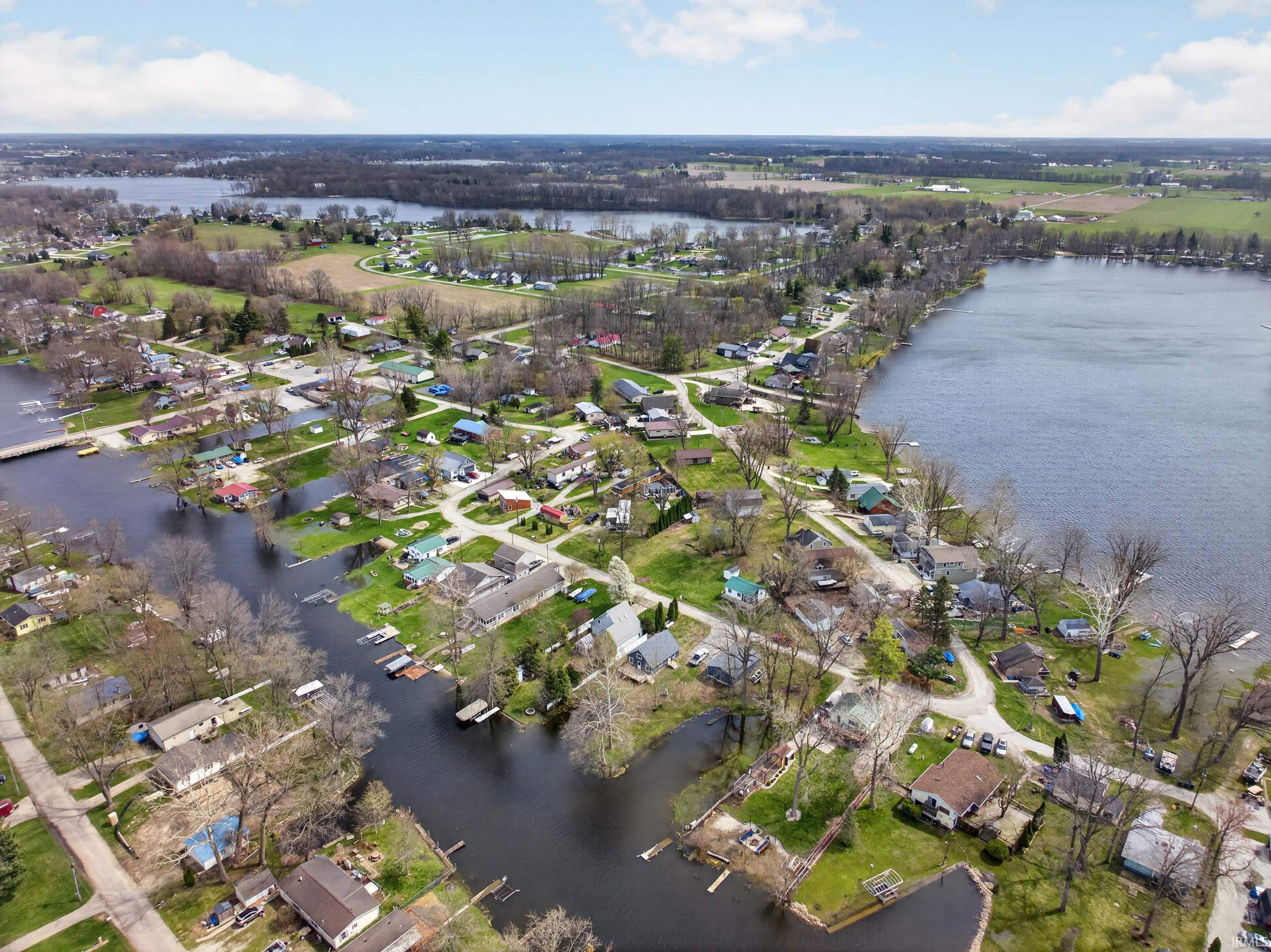 Image 3: Aerial view of residential area with a large body of water, Aerial View Image 3: Aerial view of residential area with a large body of water, Aerial View