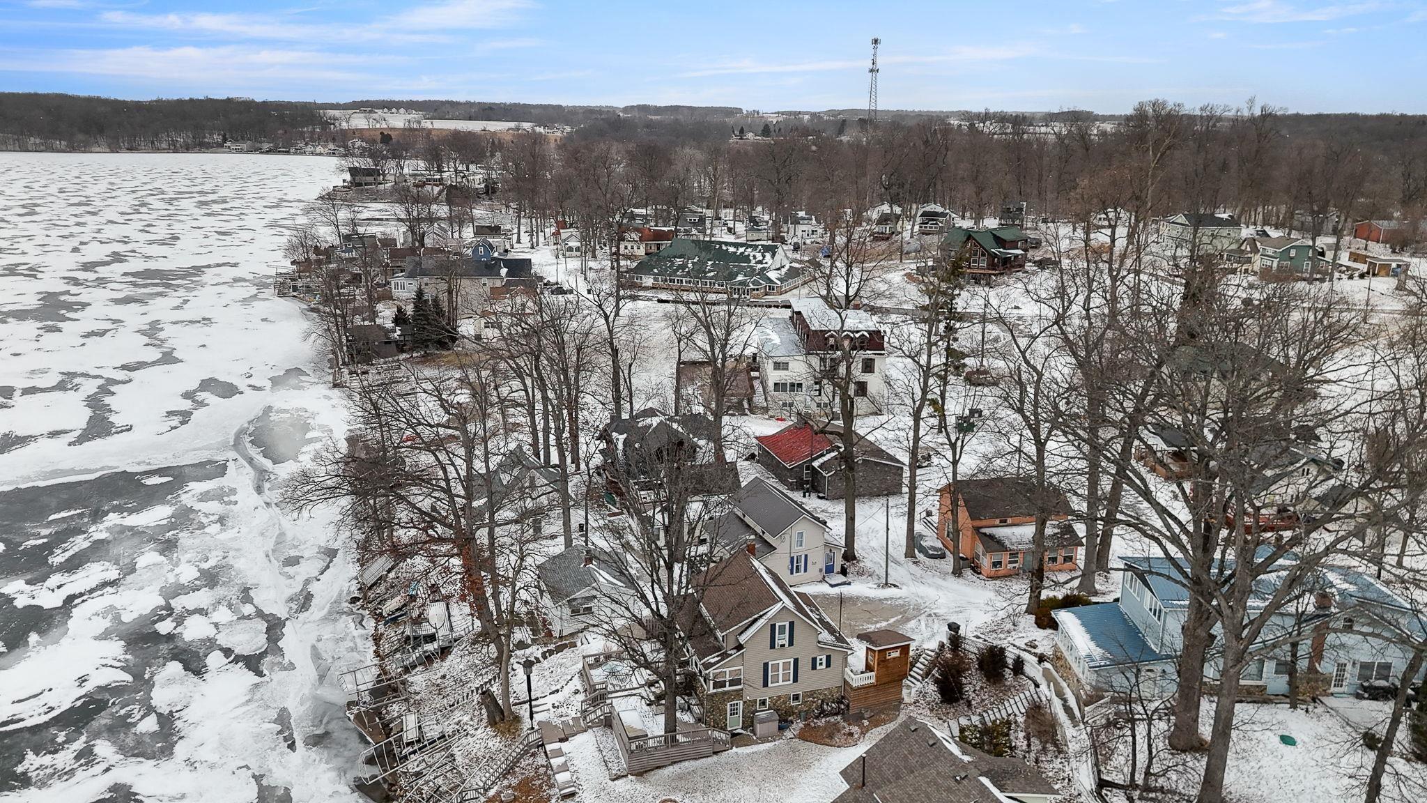Image 3: Snowy aerial view featuring a residential view, Aerial View