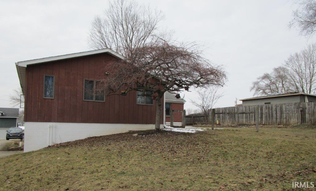 Image 3: View of side of home featuring a patio, Side Of Structure