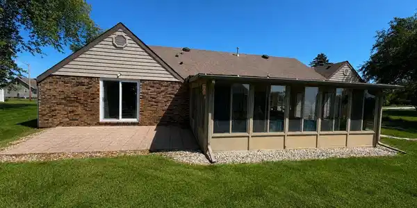 Image 3: Exterior brick and horizontal siding accents, Back Of Structure Image 3: Exterior brick and horizontal siding accents, Back Of Structure