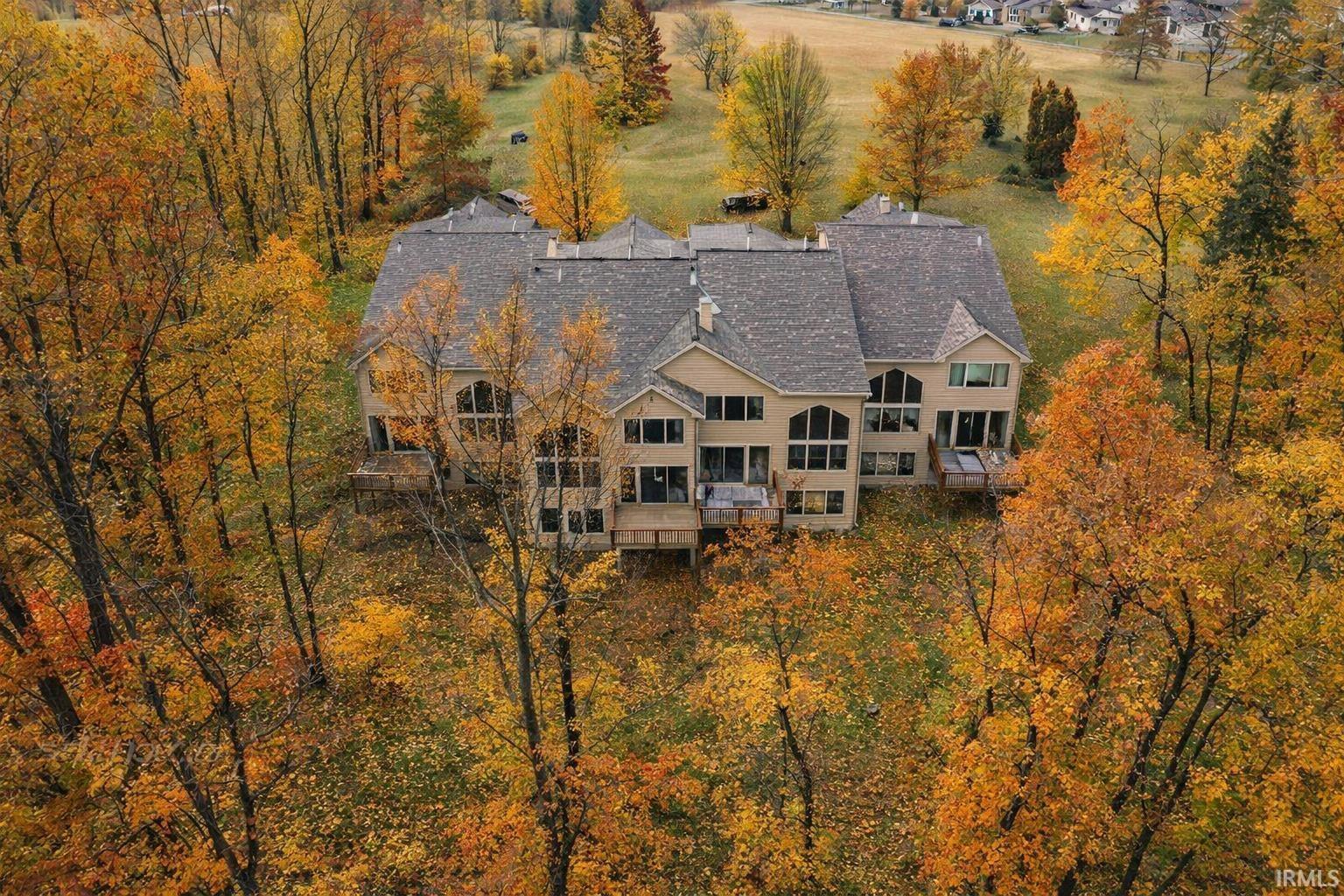Image 1: Aerial view of property and surrounding area, Aerial View