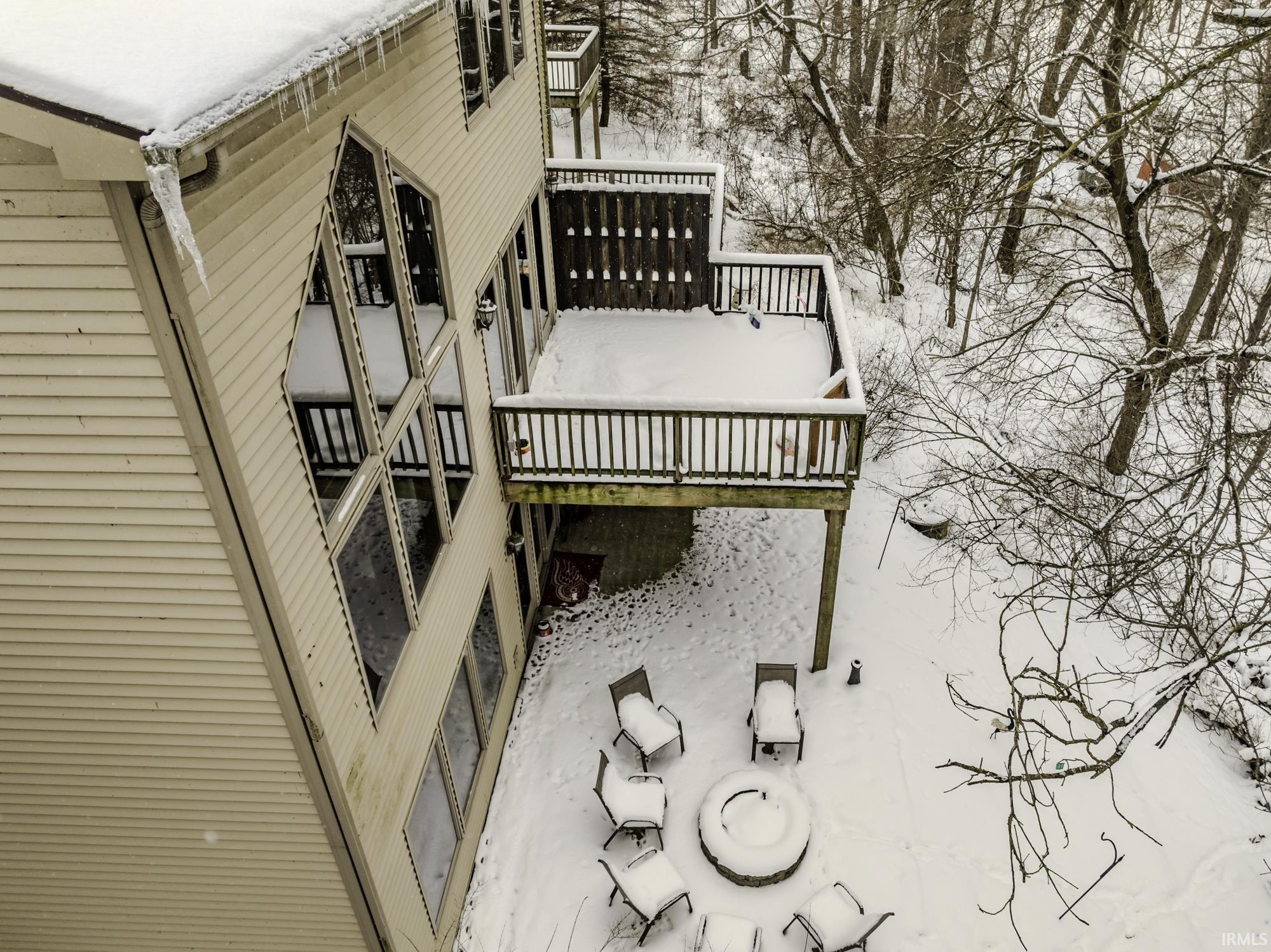 Image 3: Snow covered property featuring a deck, Side Of Structure