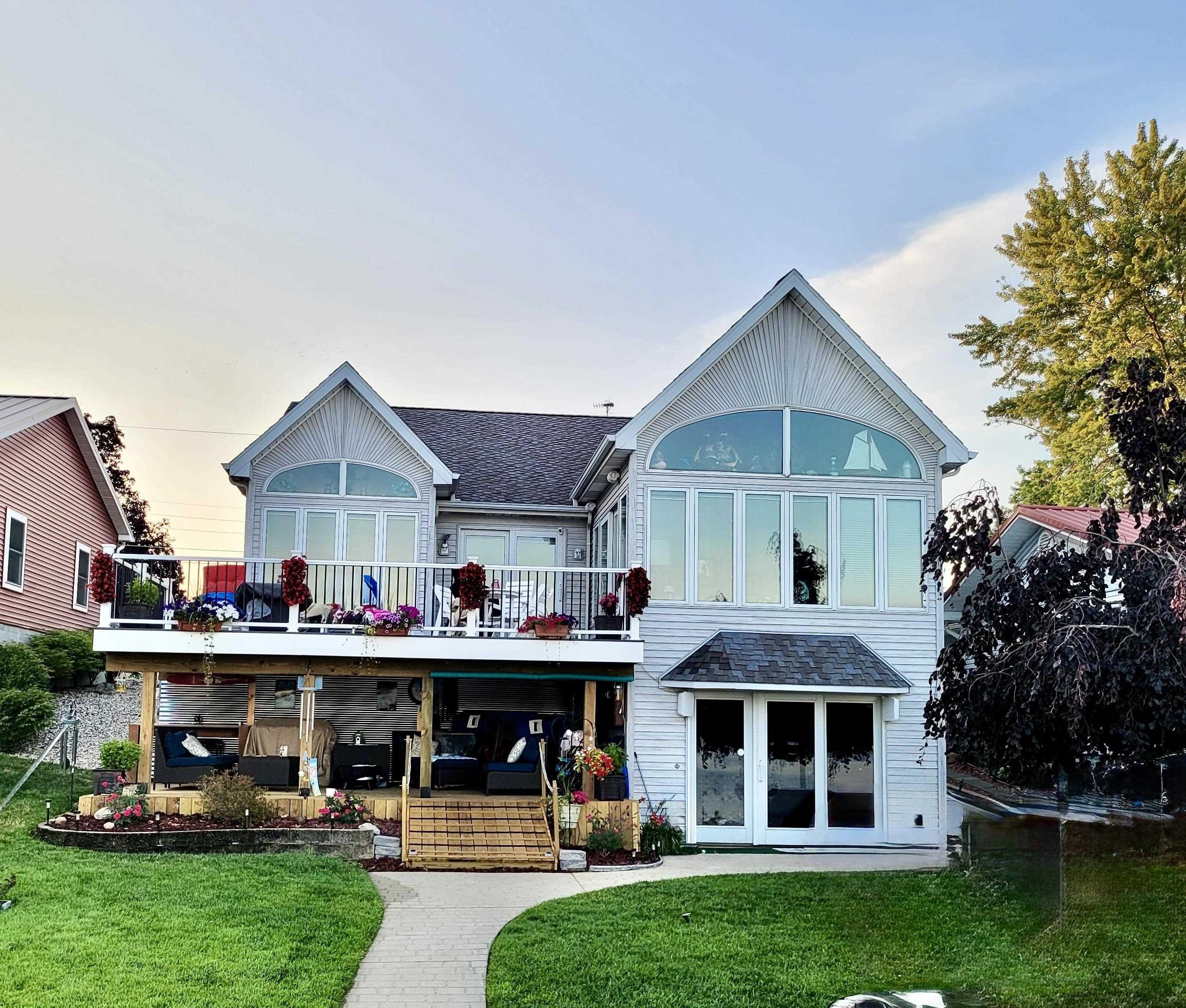 Image 1: Back of house with a yard and a shingled roof, Back Of Structure