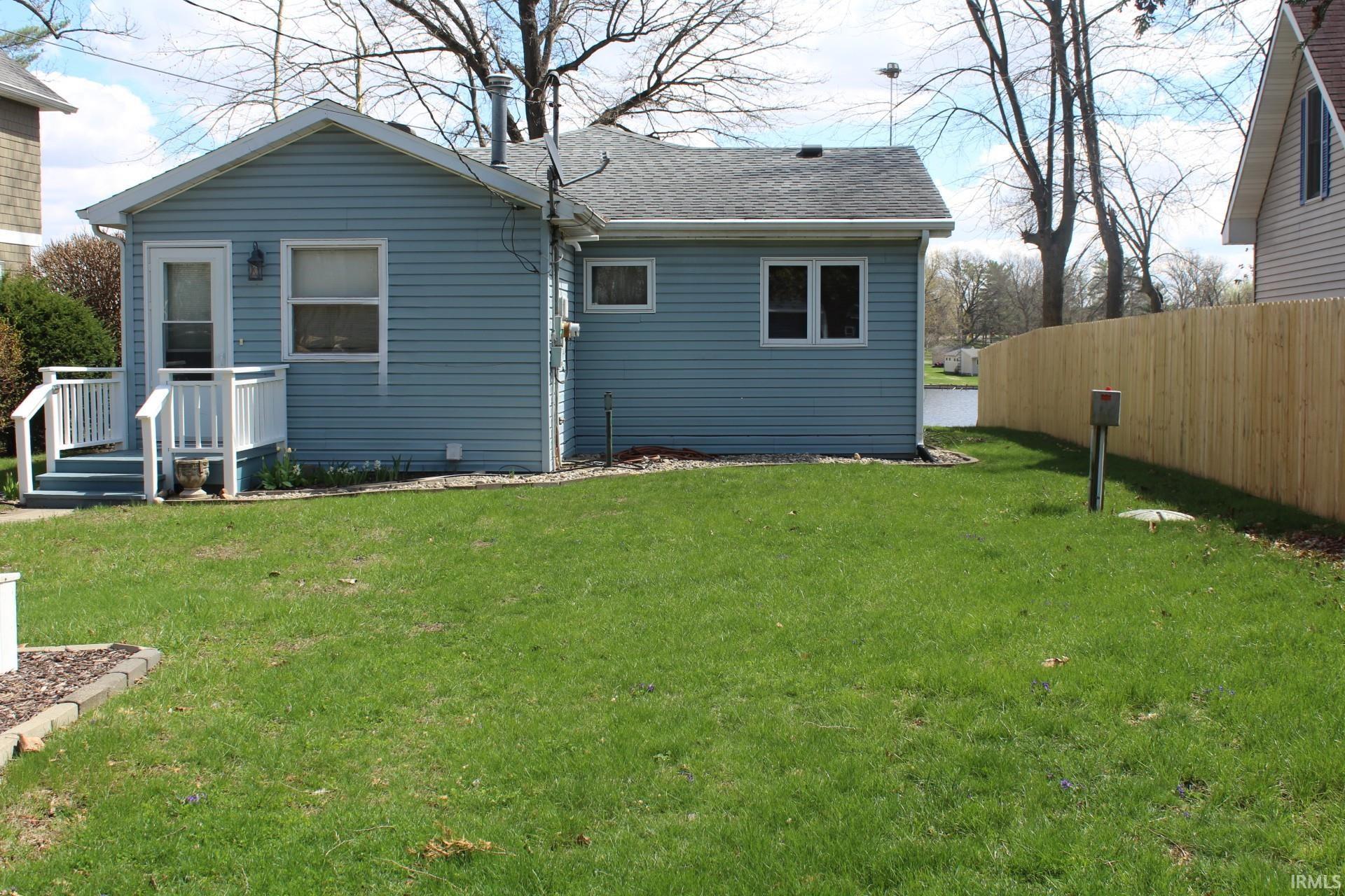 Image 3: Rear view of house featuring roof with shingles, Back Of Structure