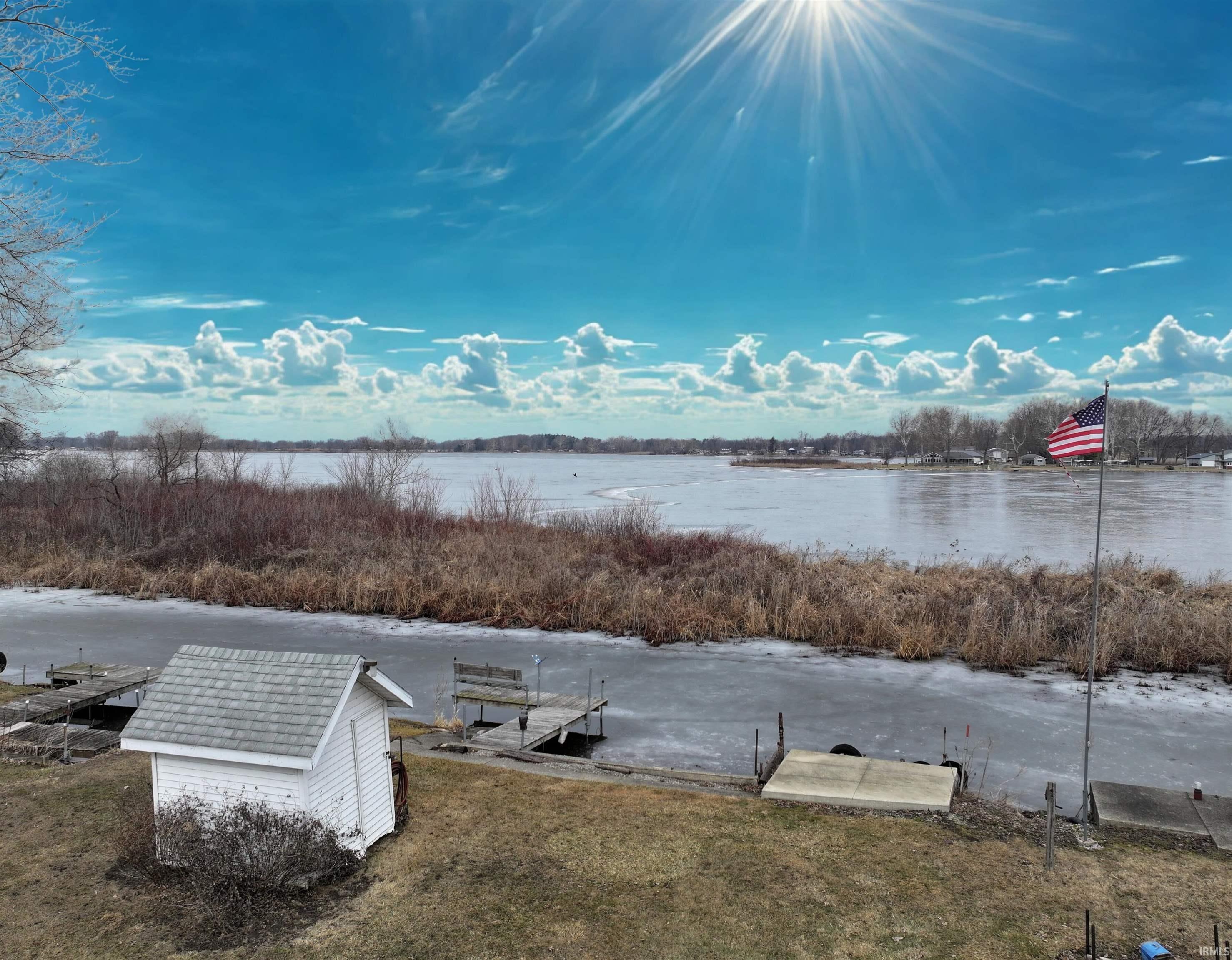 Image 2: Water view with a boat dock, View