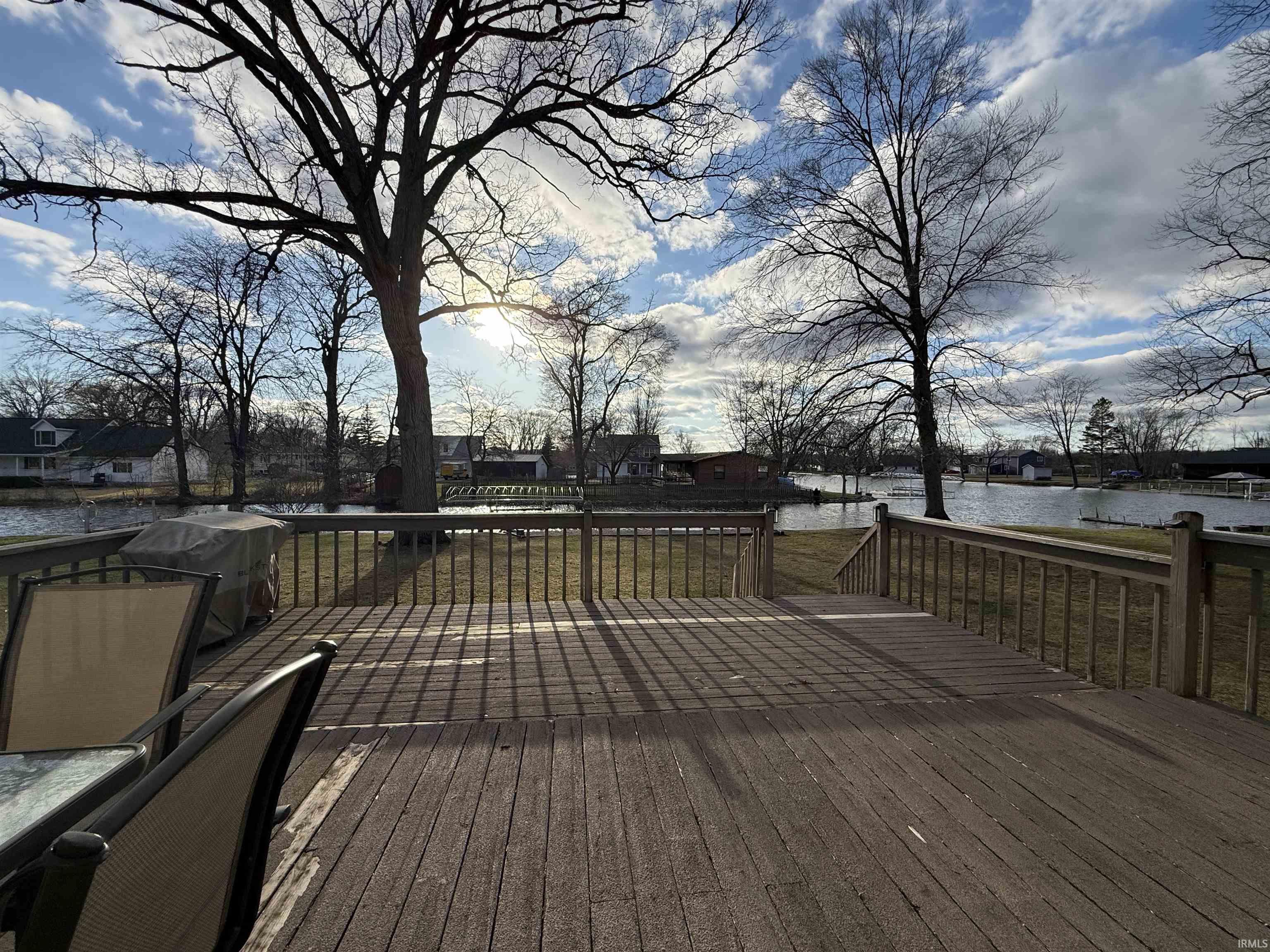 Image 2: Deck featuring a water view and a lawn, Deck Image 2: Deck featuring a water view and a lawn, Deck