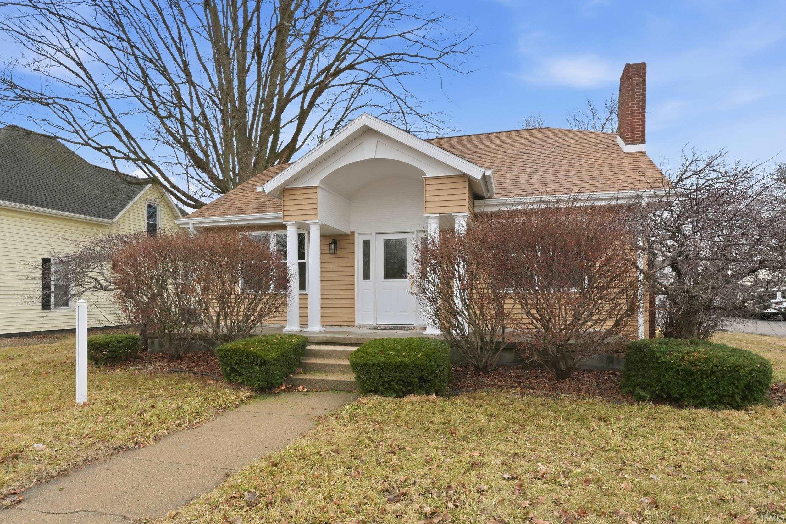 Image 0: Bungalow-style home with a front yard, a chimney, and a shingled roof, Front Of Structure