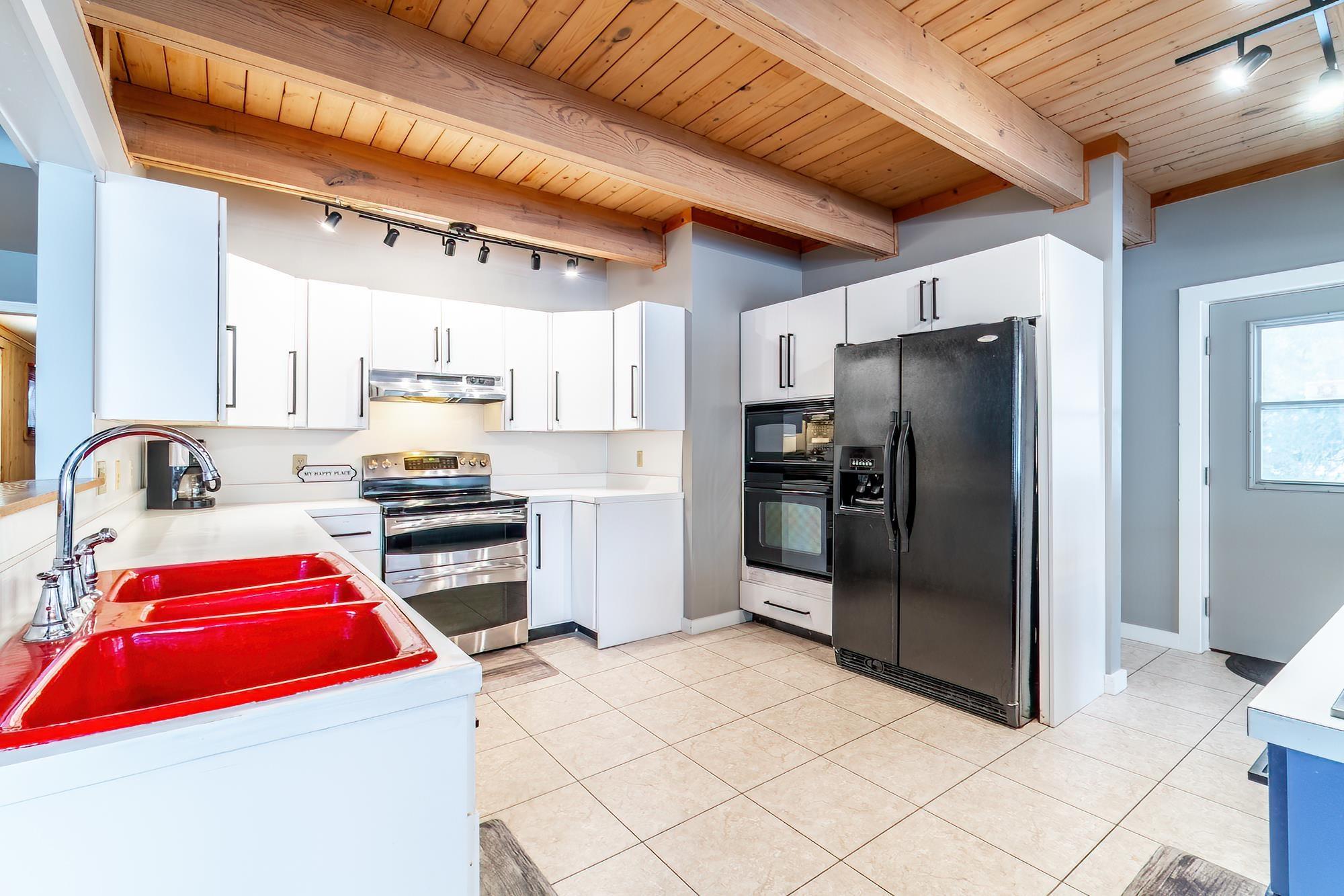 Image 3: 4685 W Nevada Mills Road, Angola, IN 46703, Kitchen Featuring 3 Ovens and Jenn-Air Electric Griddle