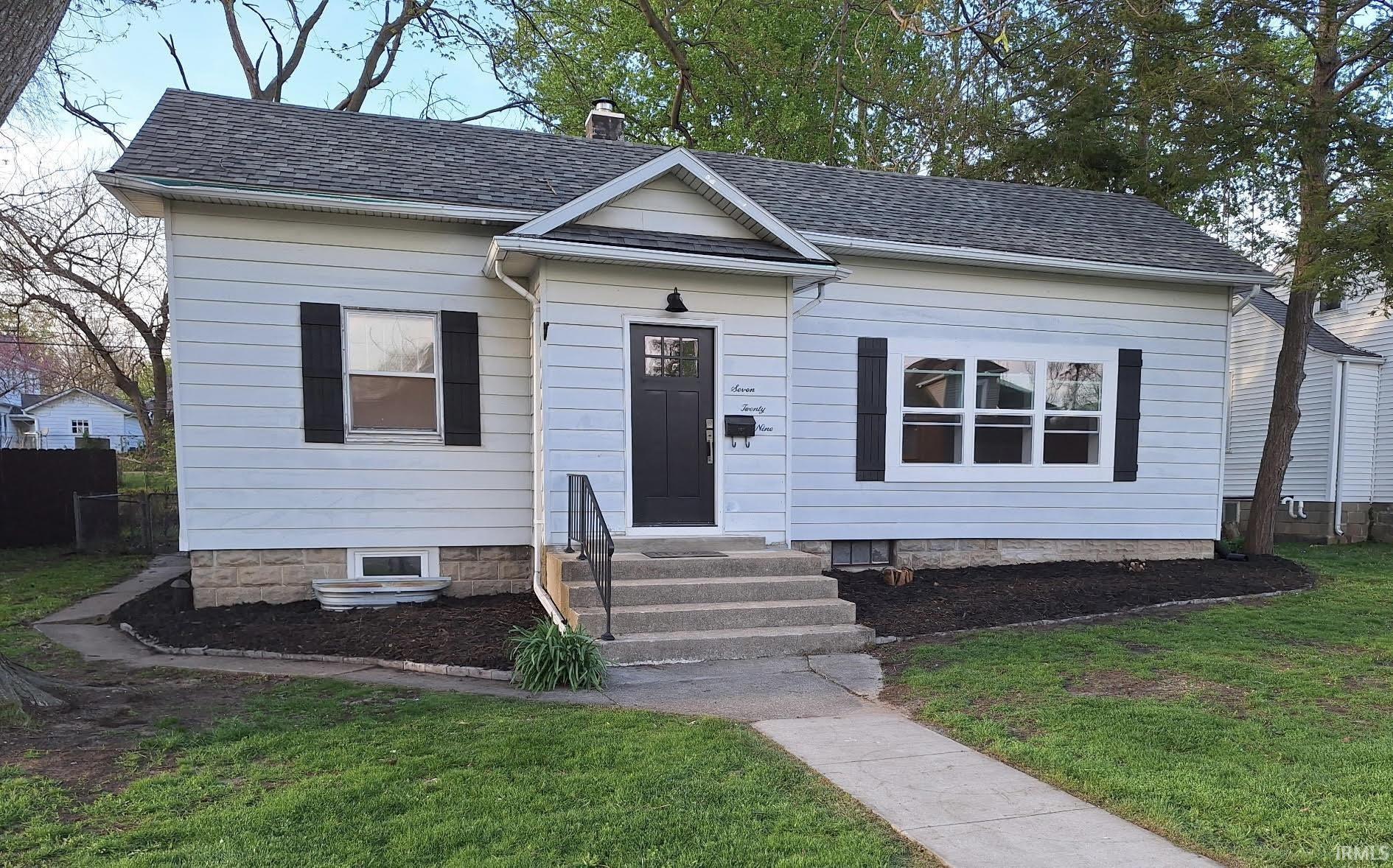 Image 0: Single-story exterior with light-colored siding and a dark shingle roof, Front Of Structure Image 0: Single-story exterior with light-colored siding and a dark shingle roof, Front Of Structure