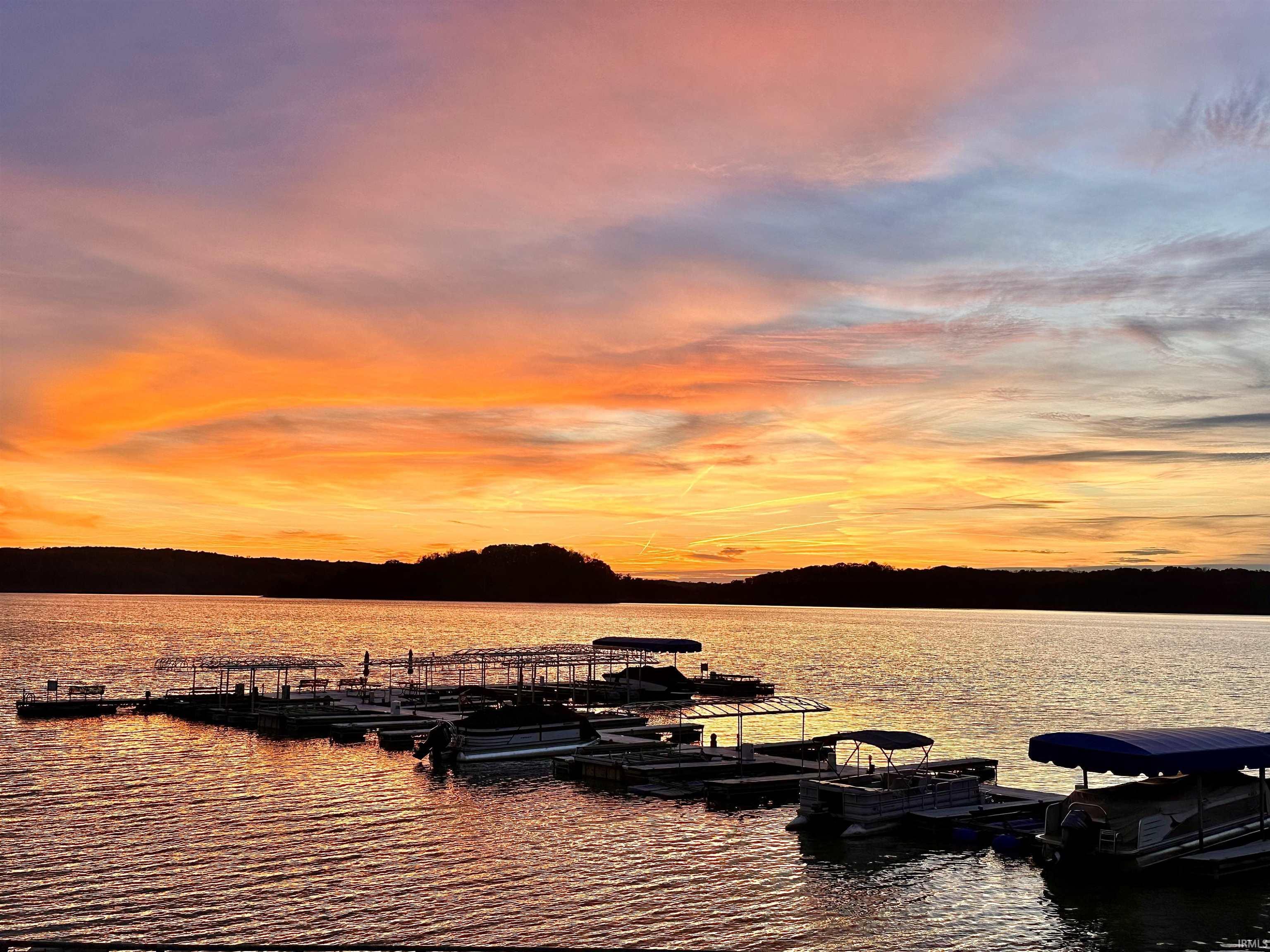 Image 3: Dock area featuring a water view, Dock