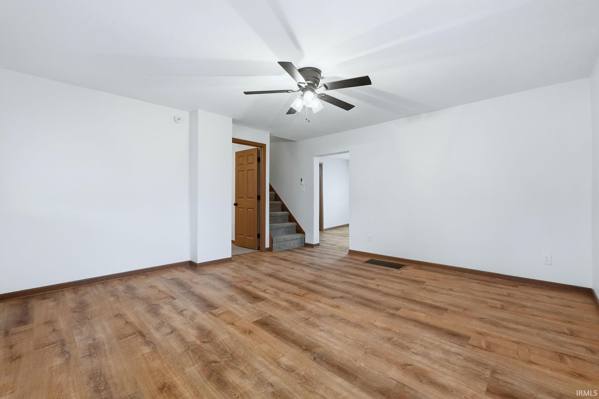 Image 3: Unfurnished room with light wood finished floors and ceiling fan, Other
