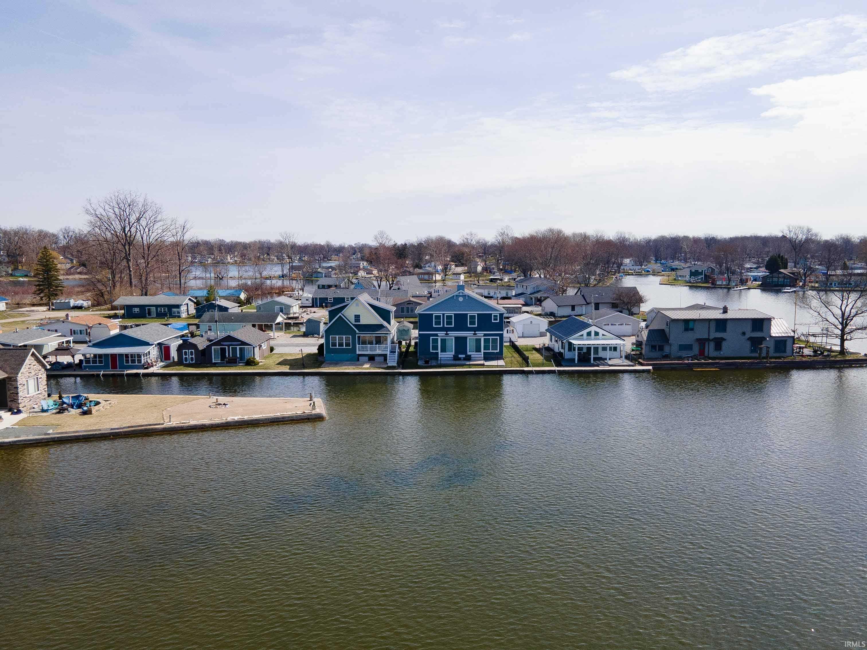 Image 3: Dock area with a residential view and a water view, Dock