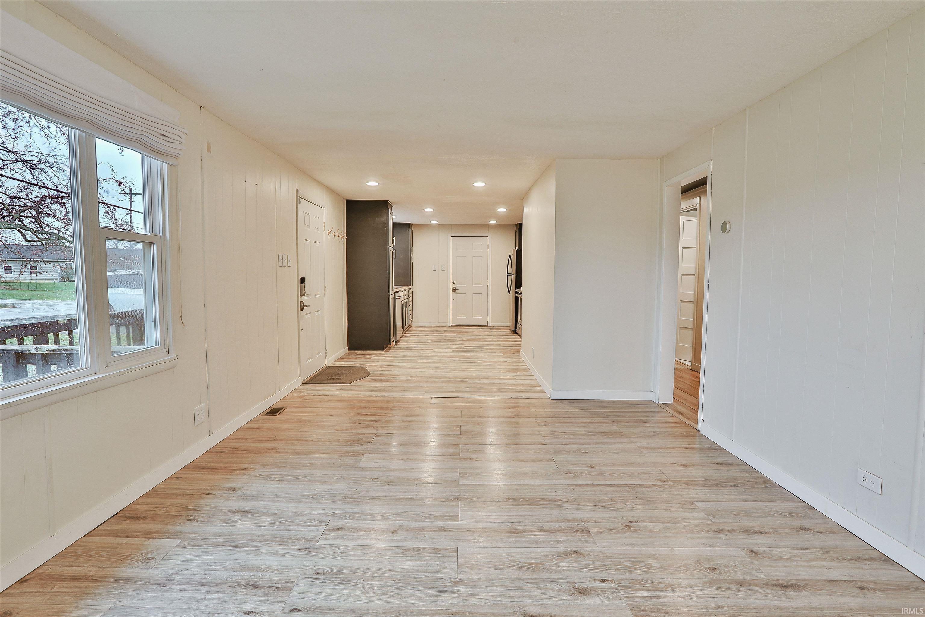Image 3: Corridor with light wood-style floors and recessed lighting, Hallway Image 3: Corridor with light wood-style floors and recessed lighting, Hallway