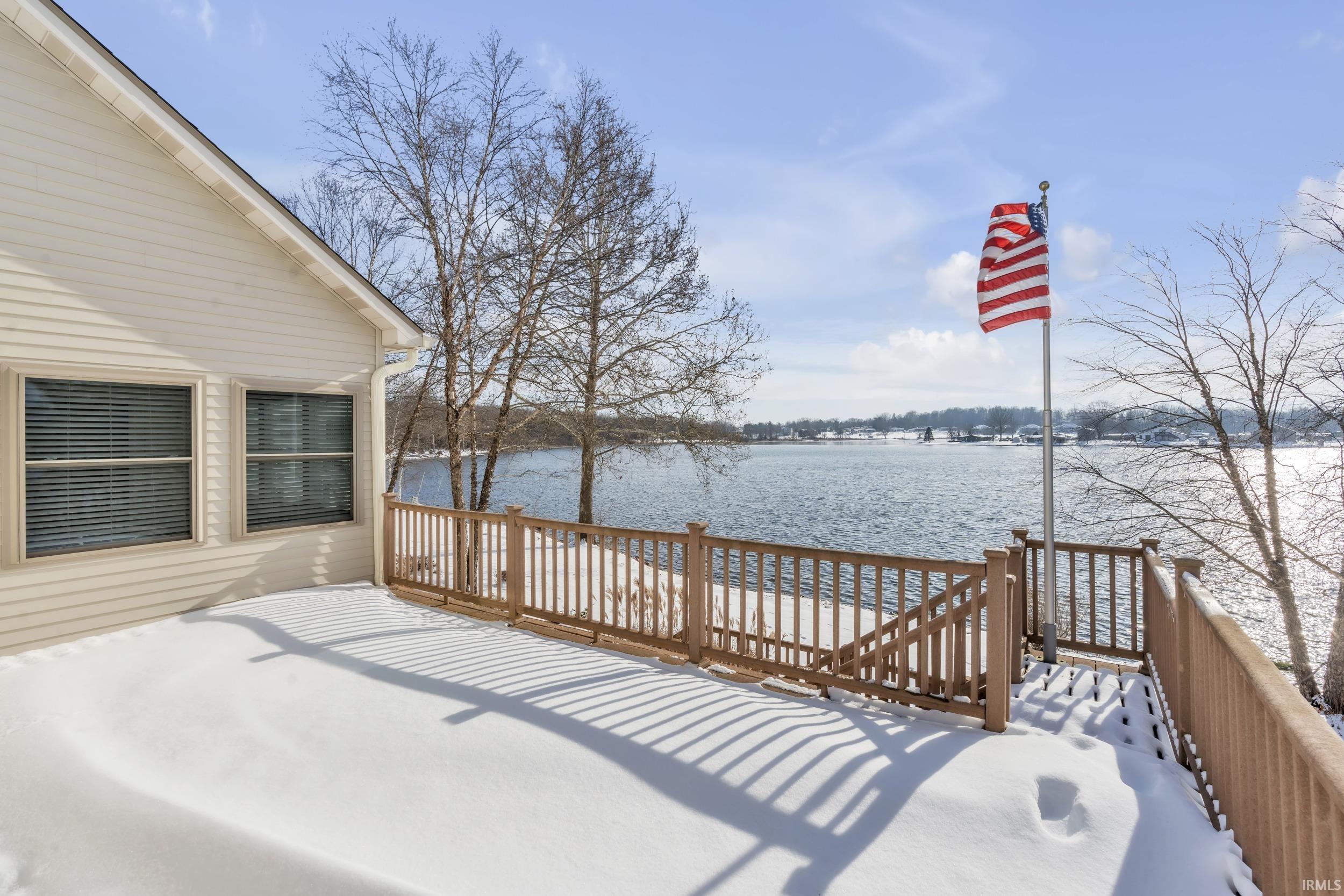 Image 2: Wooden terrace featuring a water view, Deck